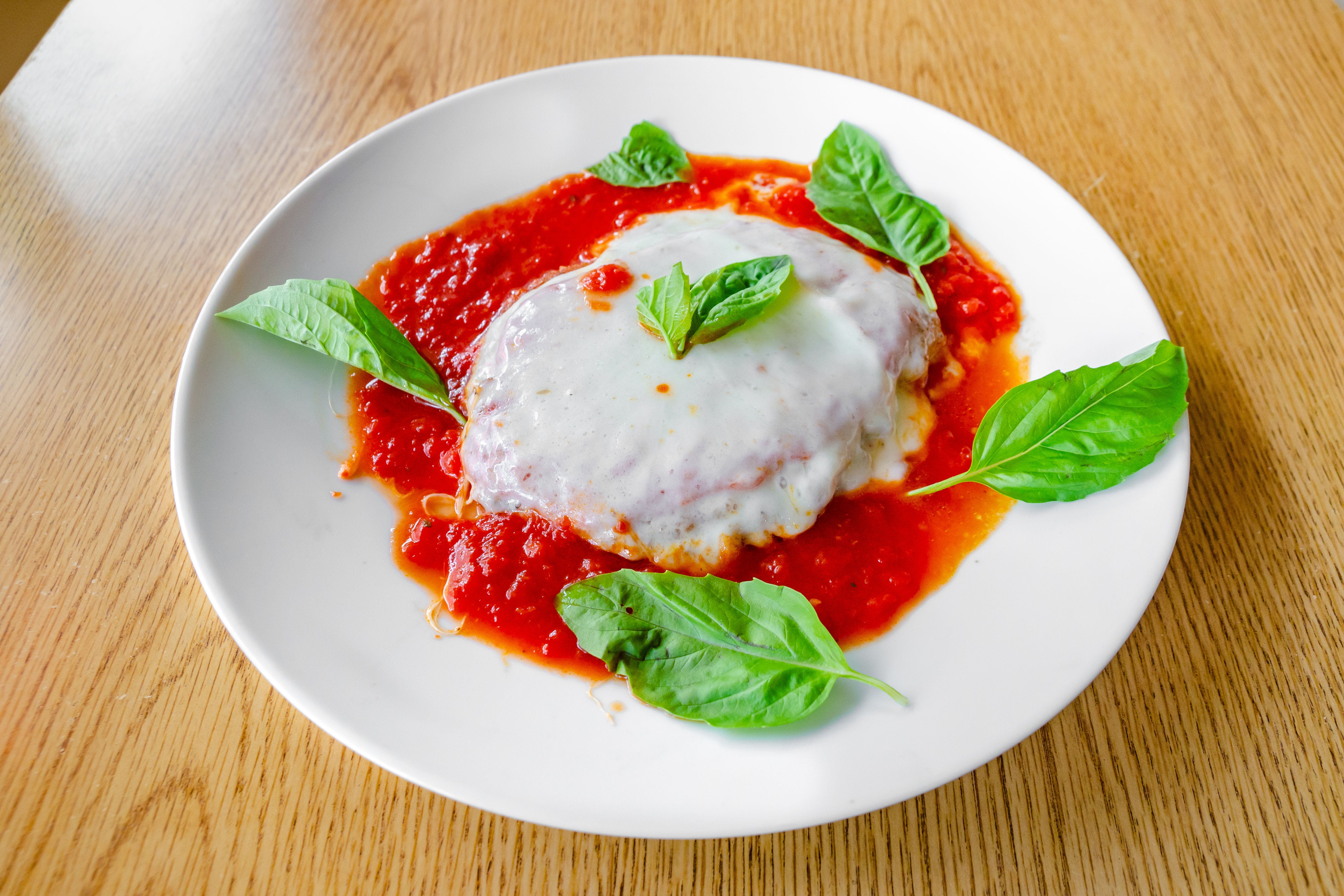 Order Chicken Parmigiana - Entree food online from New Pizza On The Block store, West New York on bringmethat.com