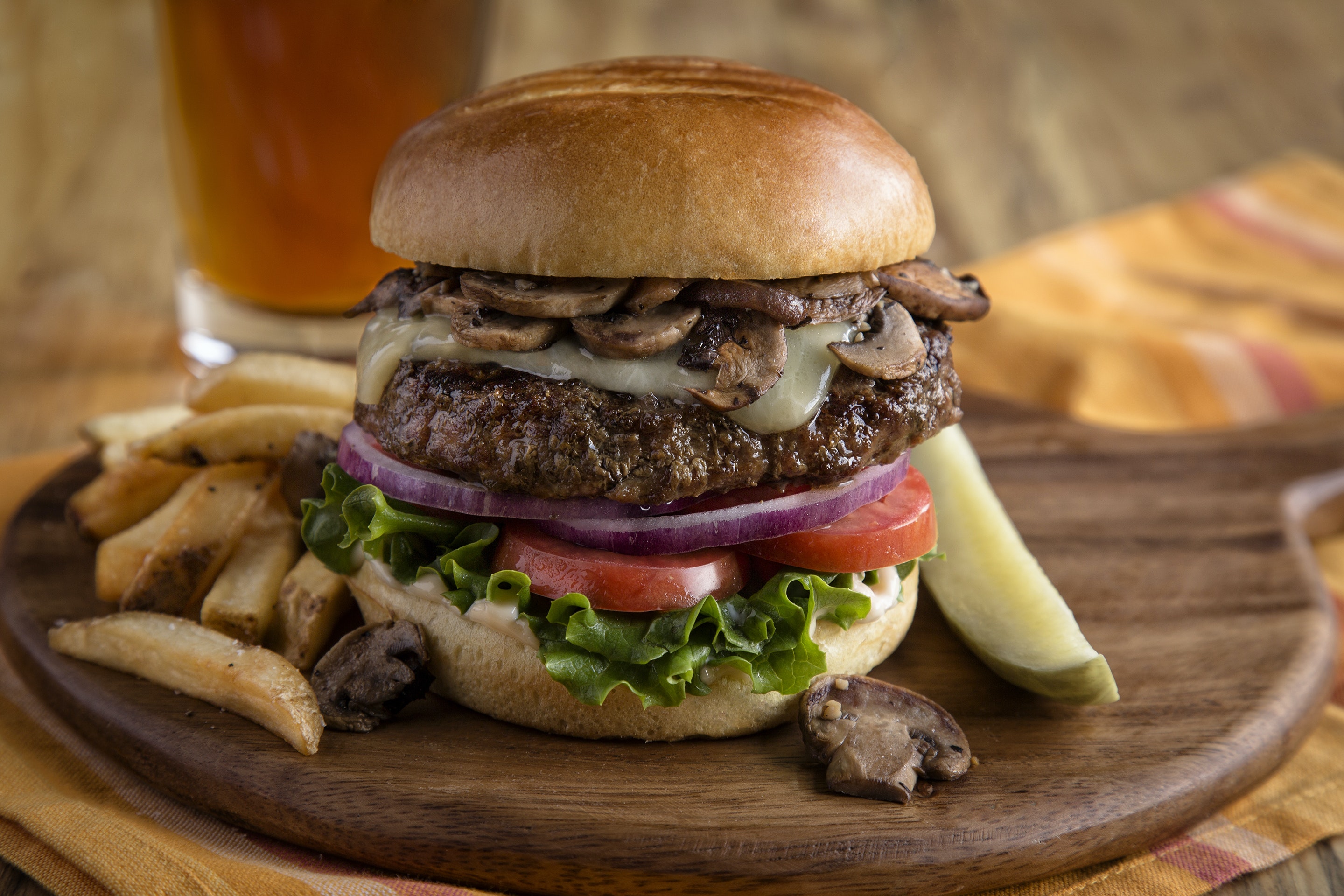 Order Aged Cheddar & Mushroom Burger food online from Uno Chicago Grill store, Frederick on bringmethat.com