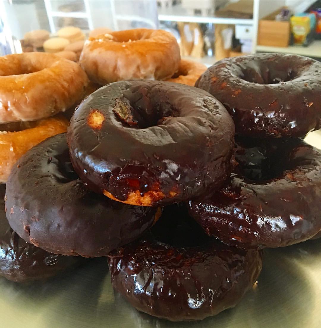 Order Vanilla and Chocolate Donut food online from Acai Jungle Cafe store, Burbank on bringmethat.com