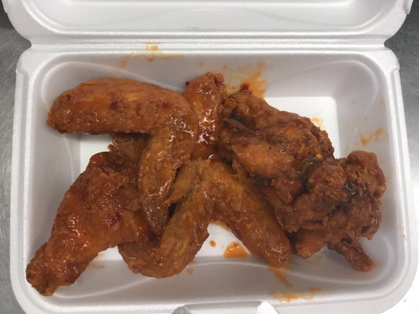 Order 9. Six Hot Wings 辣翅 food online from JJ China store, Morrisville on bringmethat.com