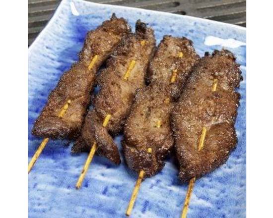 Order Teriyaki Beef Sticks (4 pcs) food online from Mo's Asian Bistro store, Chicago on bringmethat.com