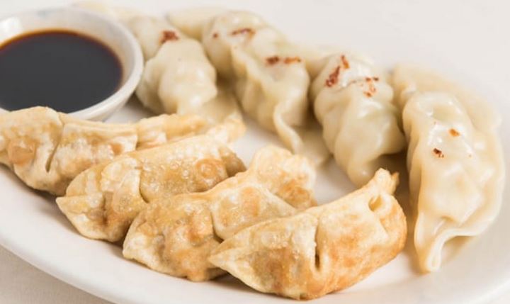 Order 4pcs of fried vegetable Gyoza/Dumpling food online from Thai Lily Cafe store, Houston on bringmethat.com