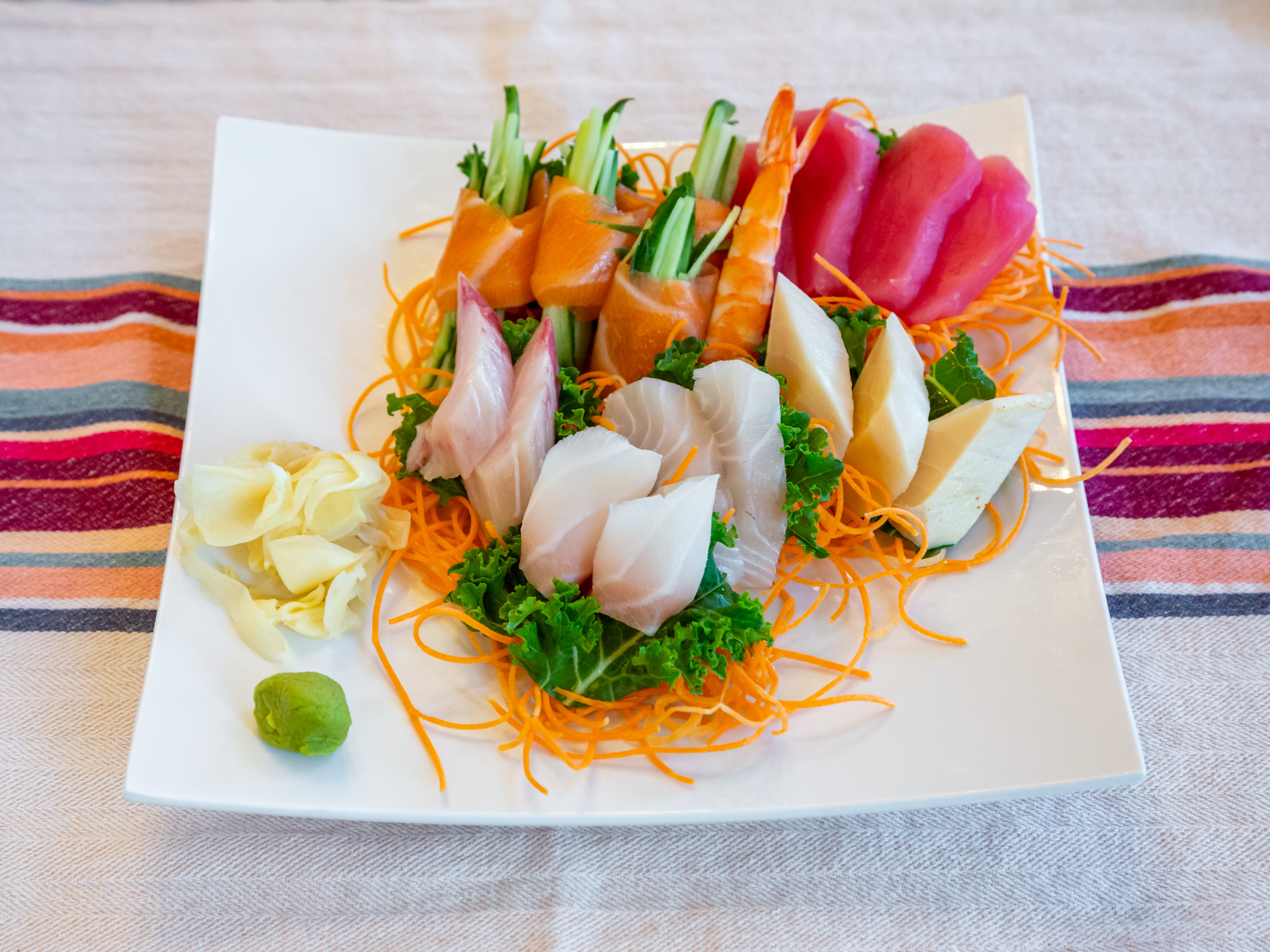 Order E5. Sashimi Deluxe food online from Joe's Kitchen store, Bayonne on bringmethat.com