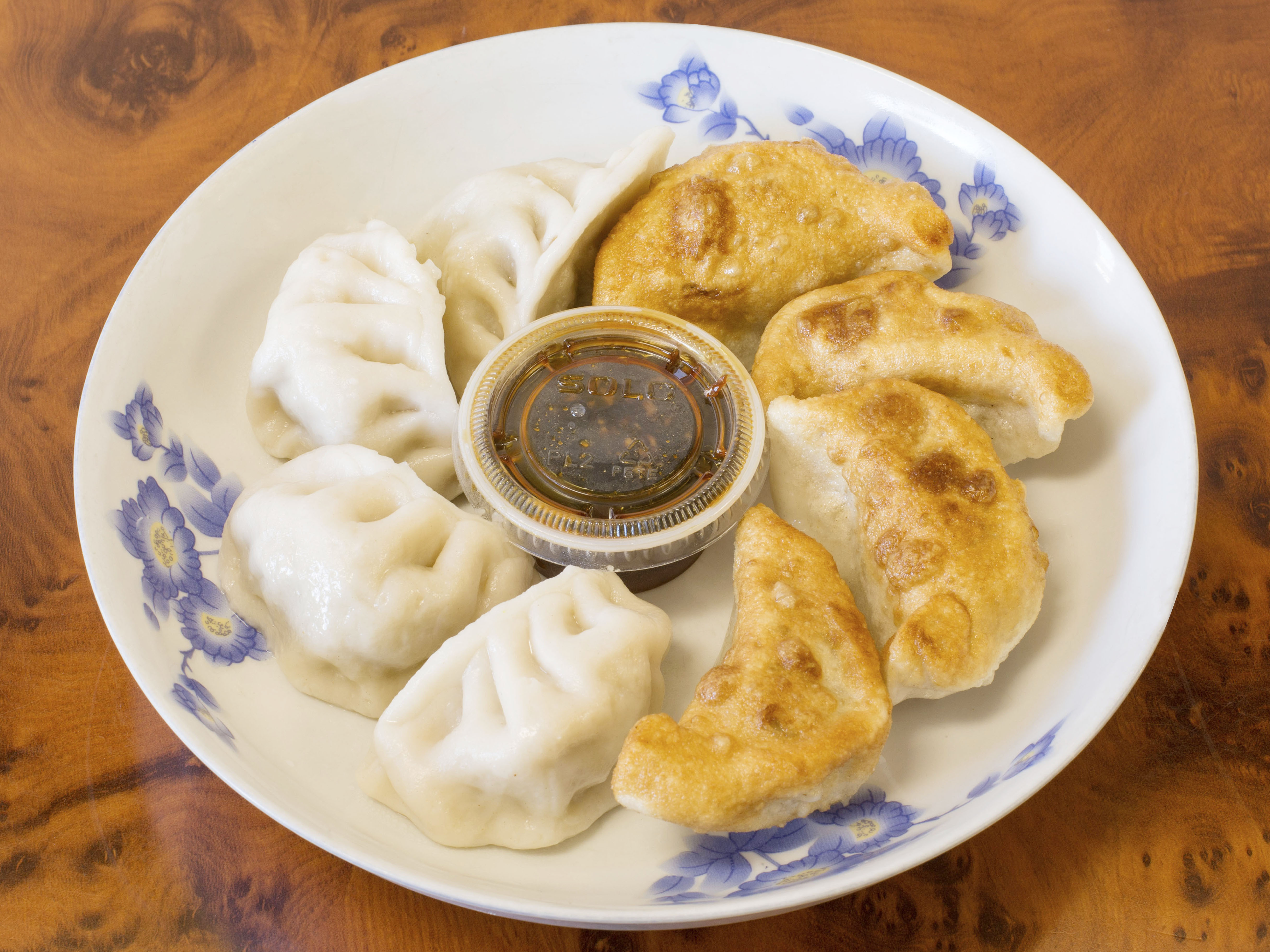 Order 14. Steamed Dumpling food online from Hong Kong Restaurant store, Hackensack on bringmethat.com