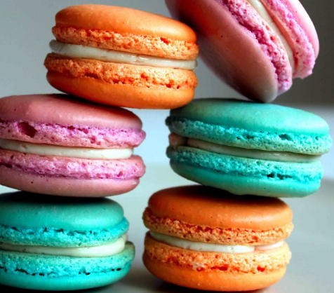 Order 16 Mini Macarons with Gift Wrap food online from Hansel & Gretel Bakery Cafe store, Suwanee on bringmethat.com