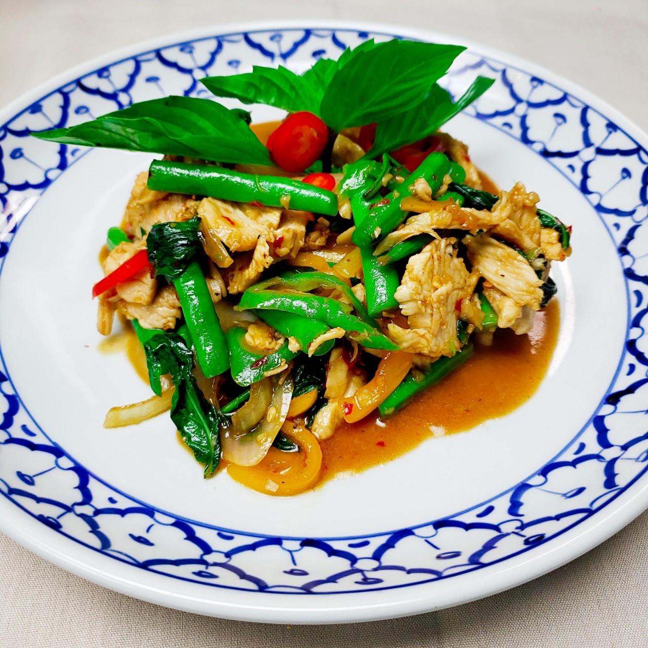 Order Pad Krapraw food online from Thai Villa store, New York on bringmethat.com