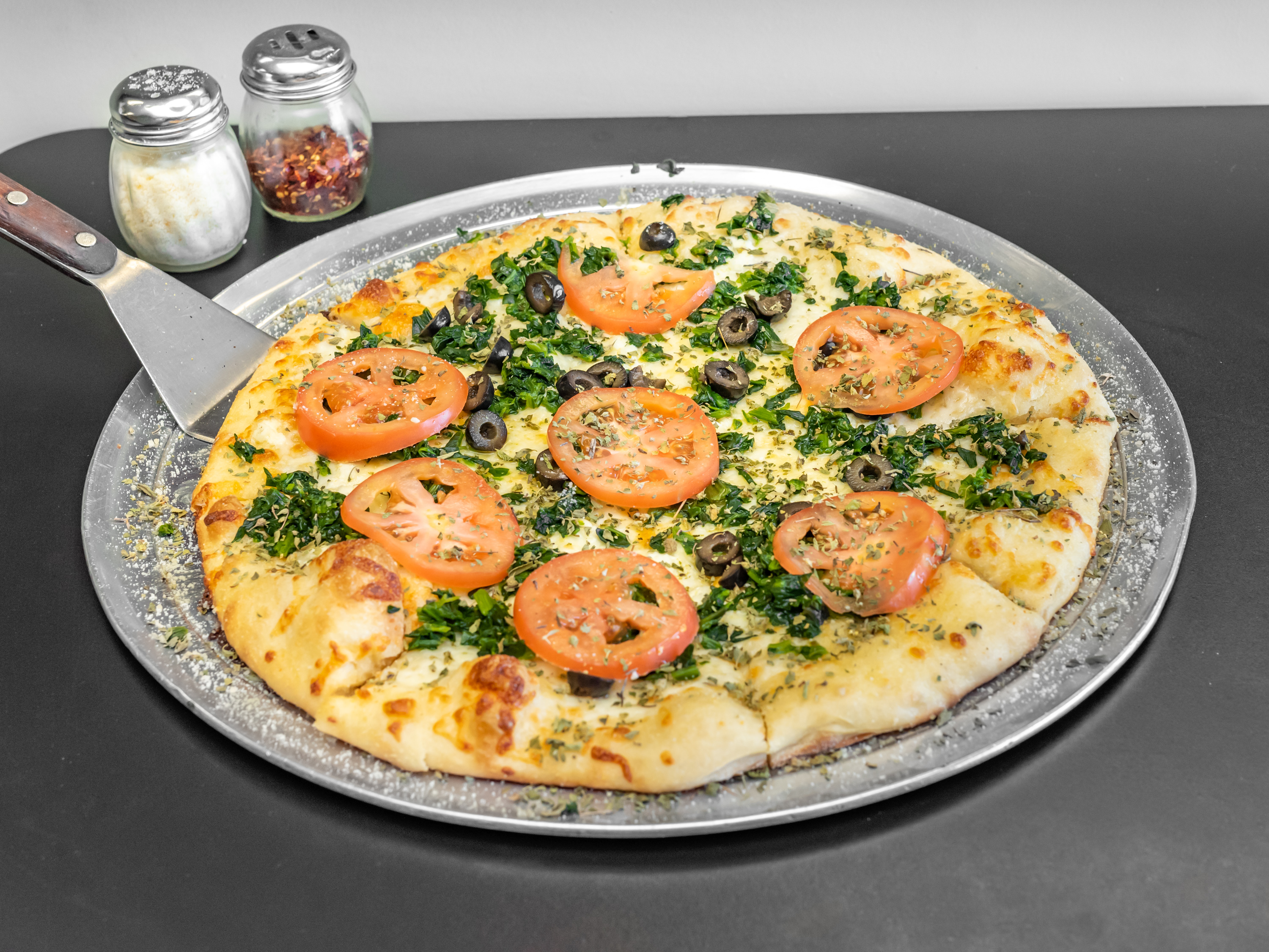 Order Spinach, Cheese and Veggie Pizza food online from Tonti's Pizzeria store, Parker on bringmethat.com