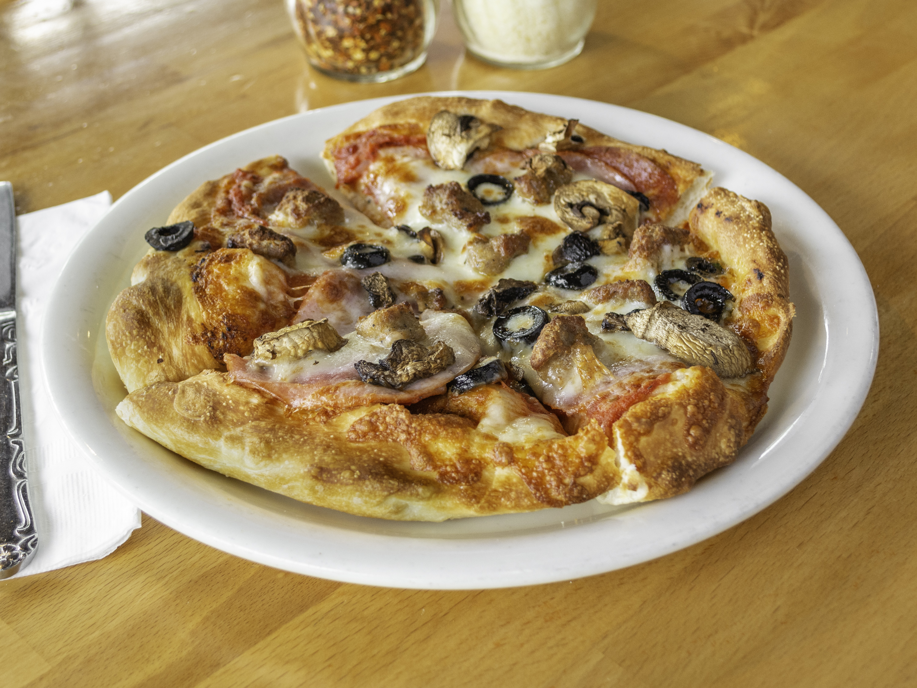 Order Romio's Special Pizza food online from Romio's Pizza store, King County on bringmethat.com
