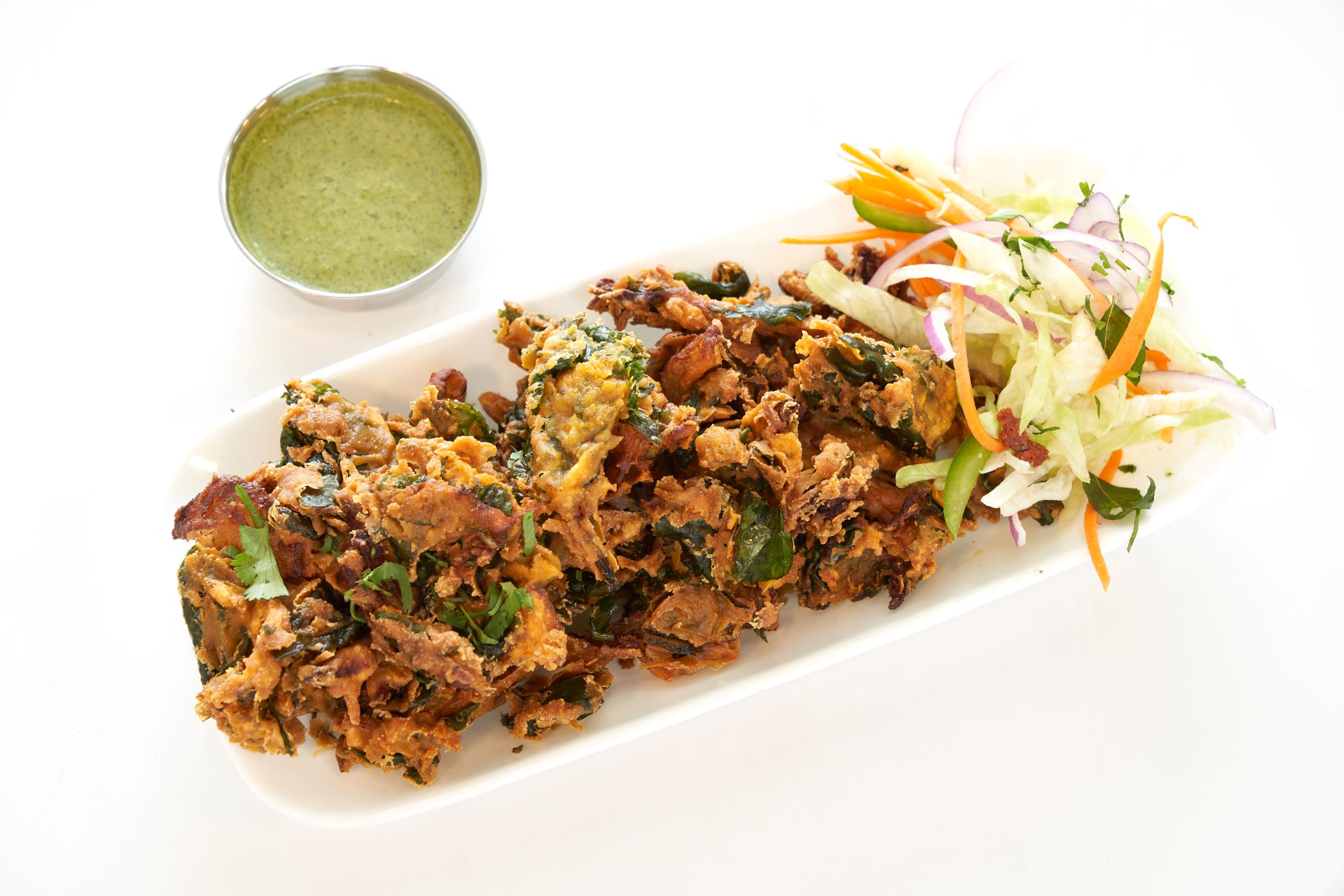 Order Onion and Spinach Pakora food online from Annapurna Grill store, Pasadena on bringmethat.com