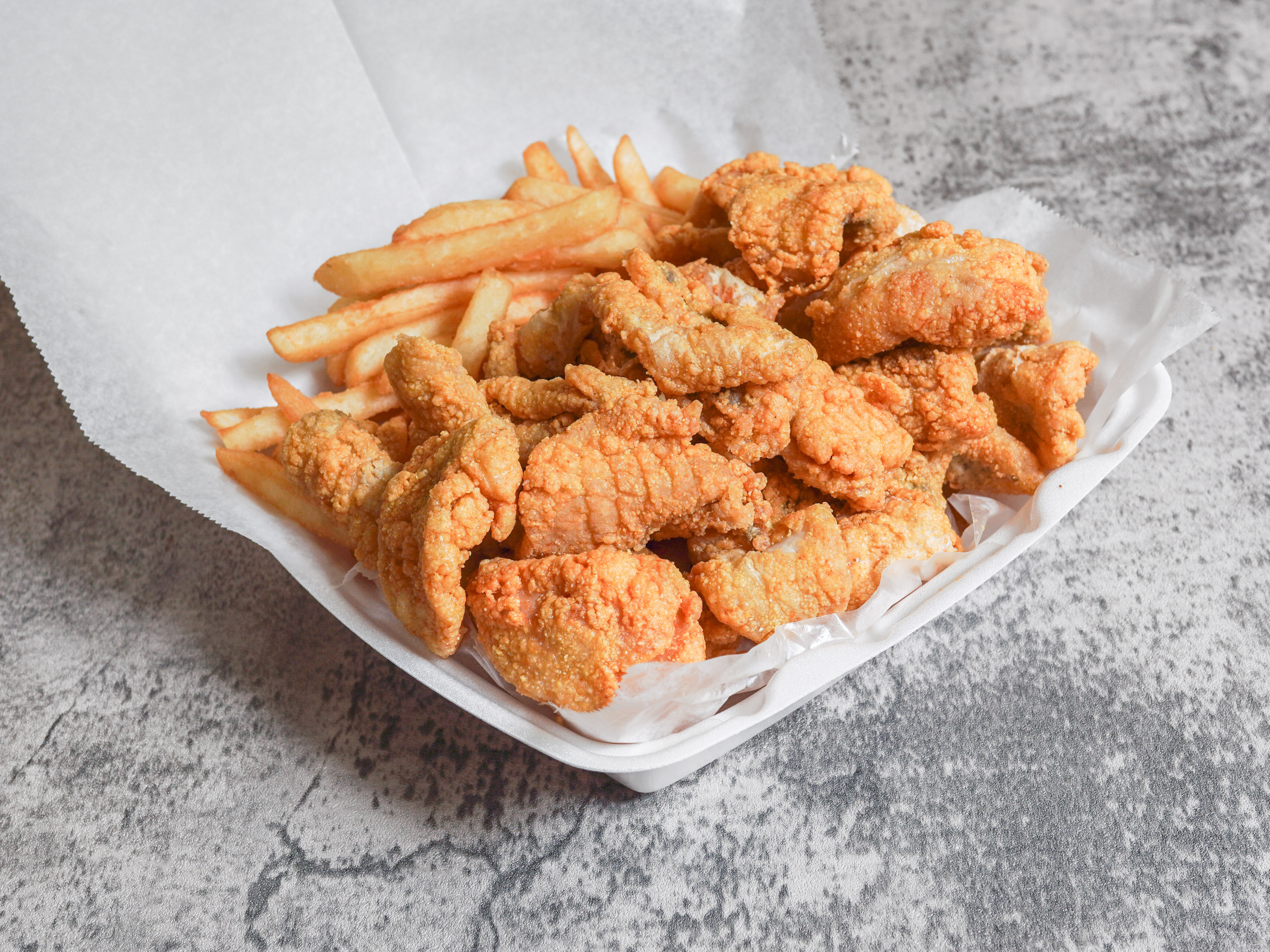 Order Catfish Nuggets Dinner food online from Sharks Fish & Chicken store, Country Club Hills on bringmethat.com