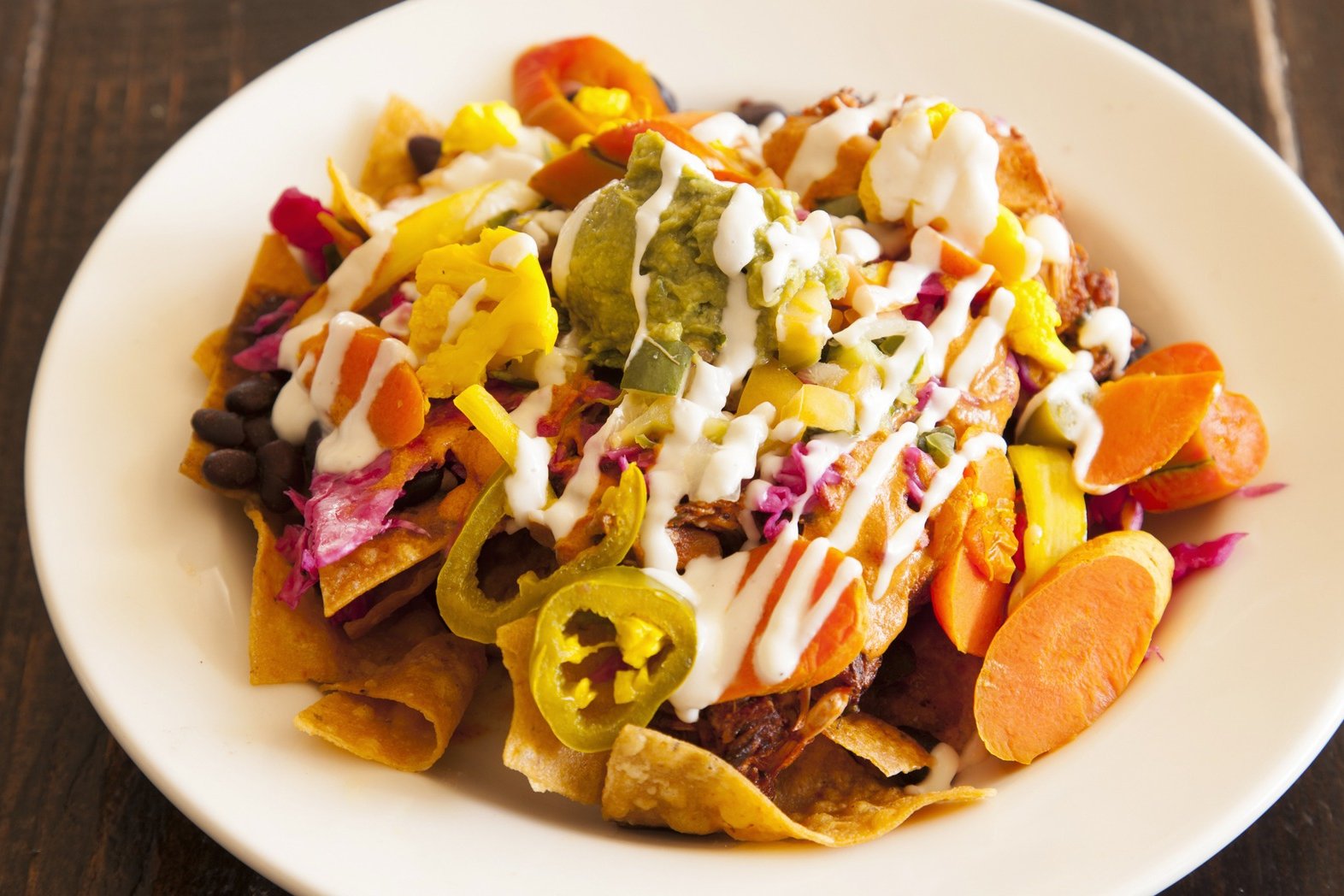 Order Loaded Nachos food online from Sage Plant Based Bistro & Brewery store, Culver City on bringmethat.com