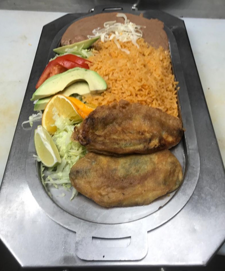 Order Chiles Rellenos food online from Taqueria Amigo Chino 2 store, Chicago on bringmethat.com