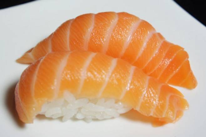 Order Salmon(sake) Nigiri food online from Wu's Garden store, Upper Leacock on bringmethat.com