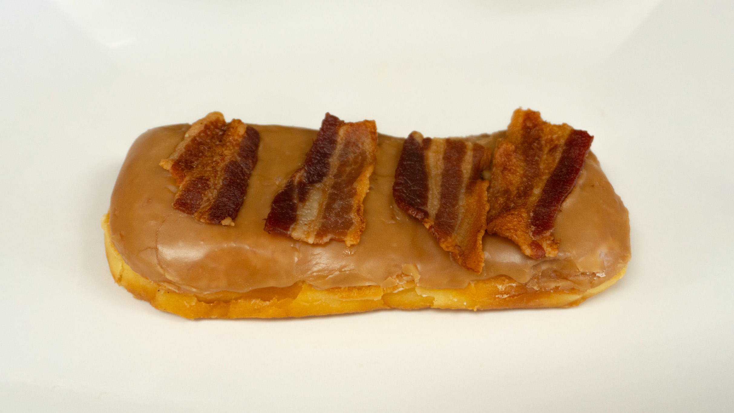 Order Bacon Maple Bar Donut food online from Rainbow Donuts store, Norwalk on bringmethat.com