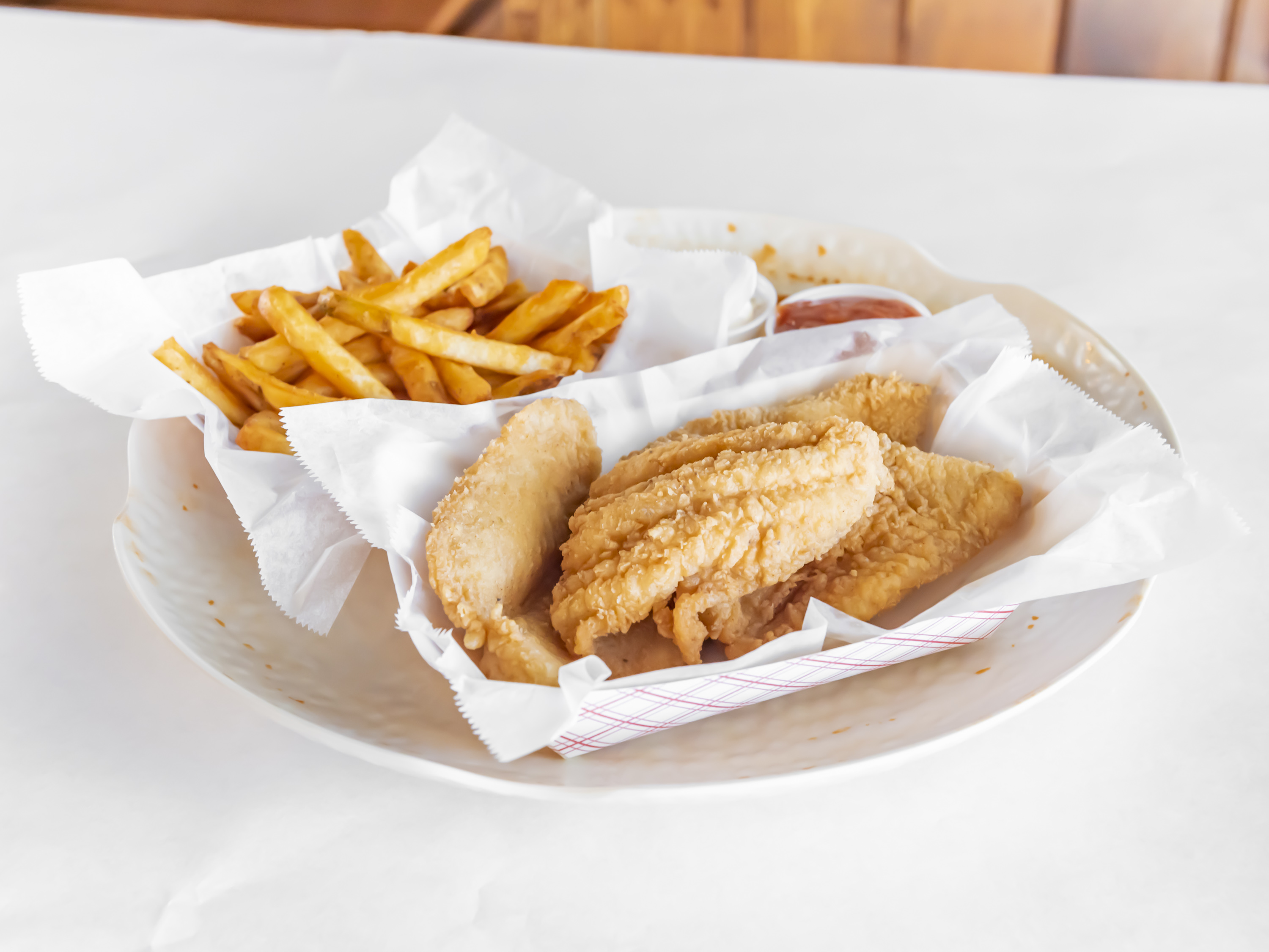 Order   L11. Fried Catfish and Tilapia Basket Lunch Special food online from Pier 11 Boiling Seafood & Bar store, Reynoldsburg on bringmethat.com