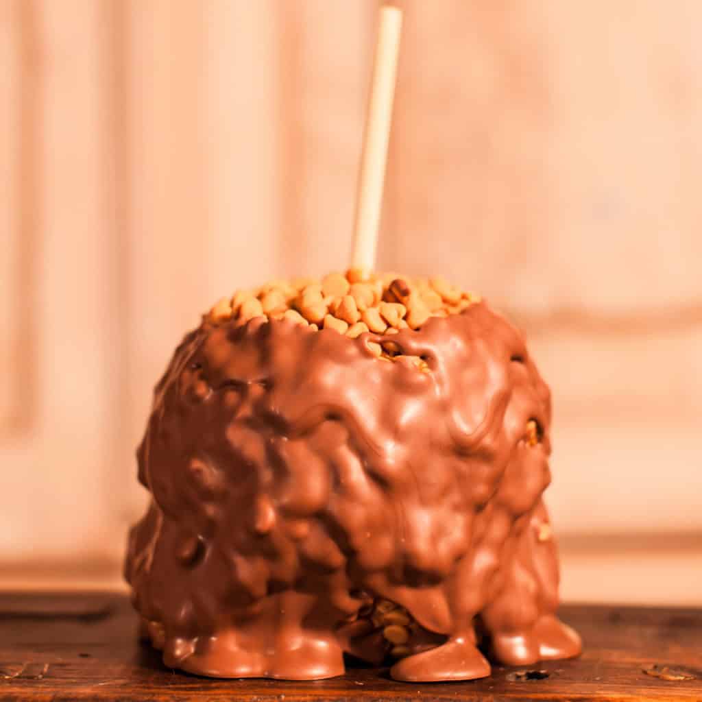Order Peanut Butter Chip Caramel Apple with Chocolate food online from Candy Apple Shoppe store, Glenwood on bringmethat.com