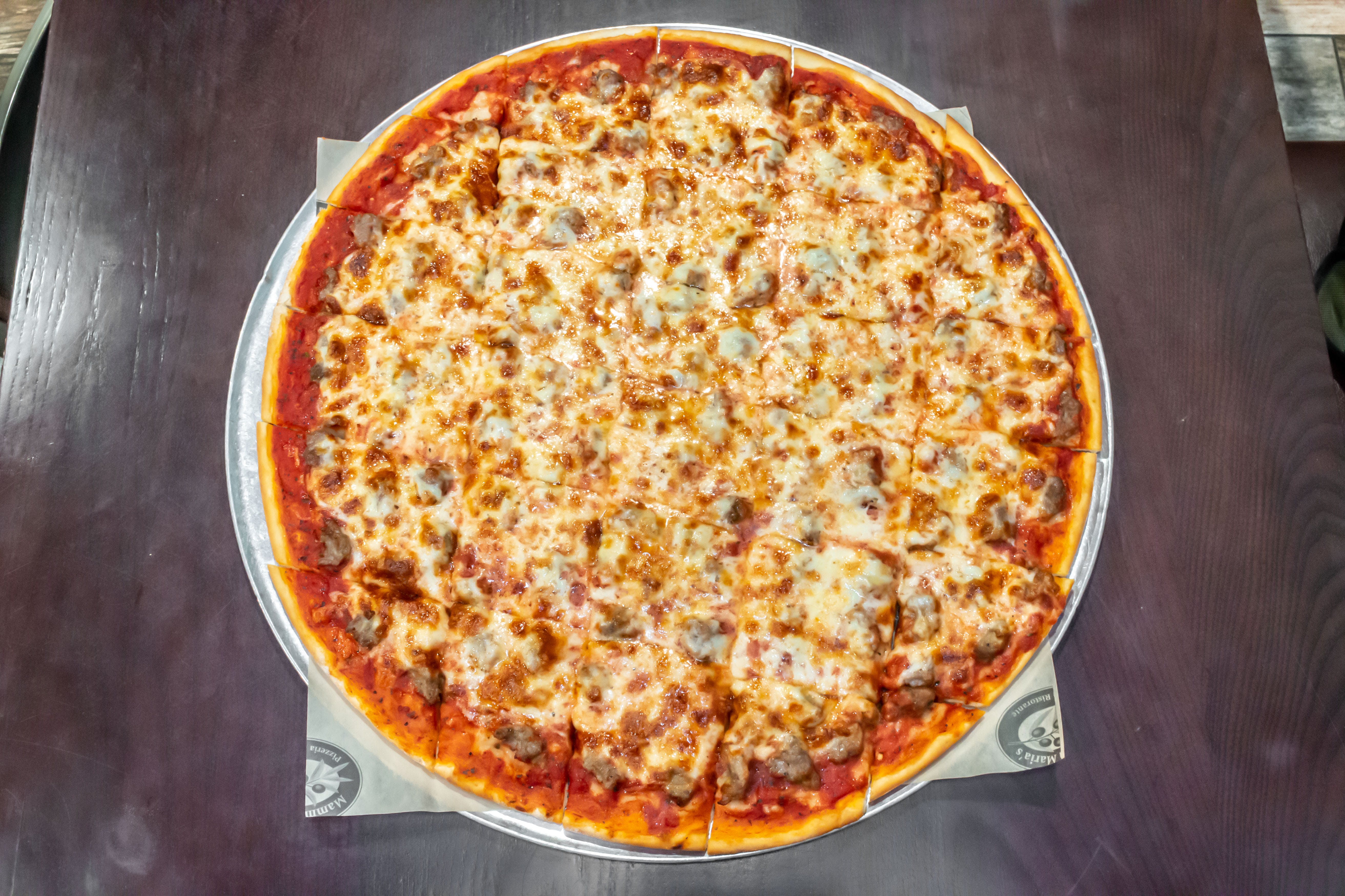 Order Sausage Pizza Slice - Slice food online from Mamma Maria's Pizzeria and Ristorantes store, Bensenville on bringmethat.com