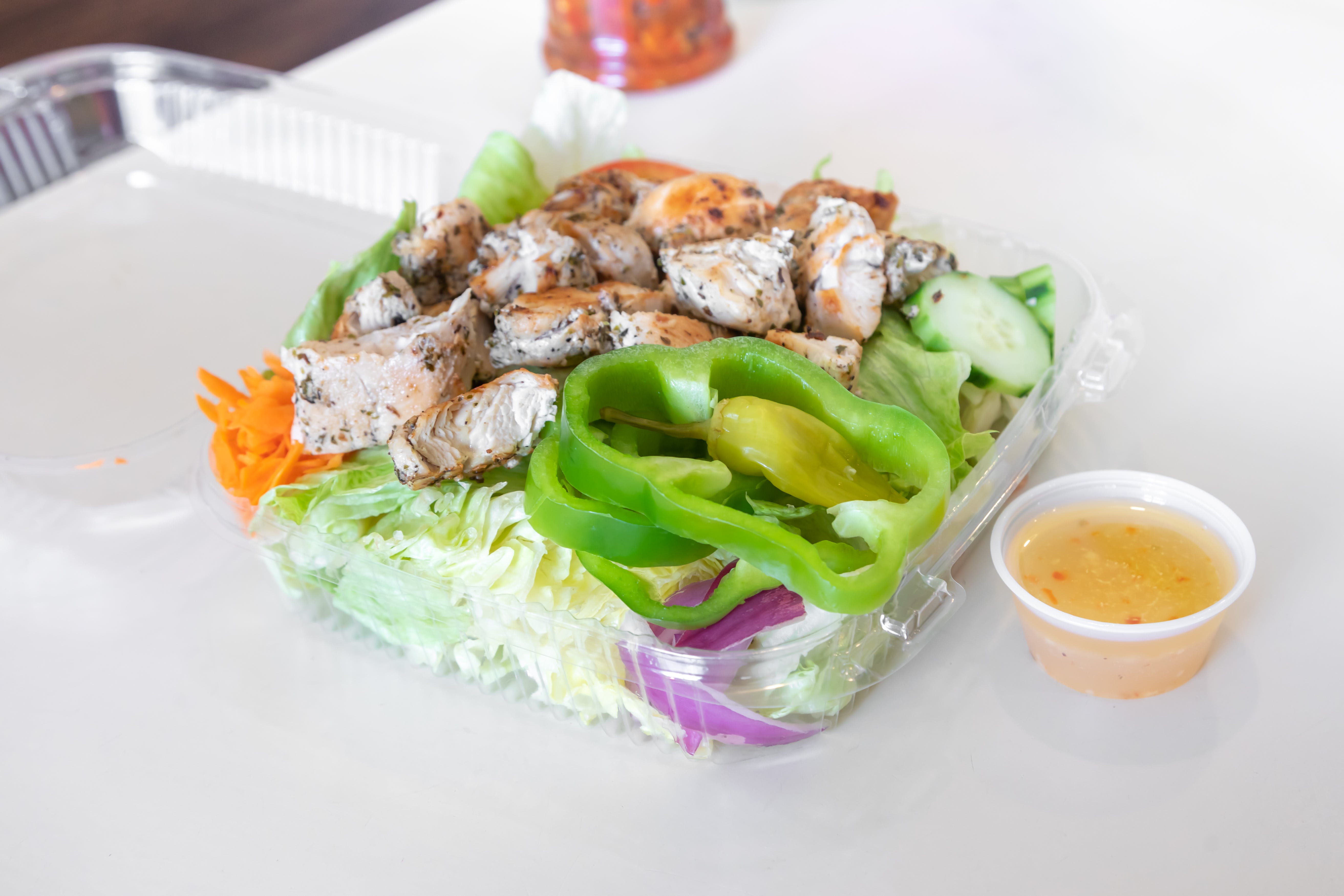 Order Garden Salad with Grilled Chicken - Salad food online from West Broadway Pizza & Seafood store, Gardner on bringmethat.com