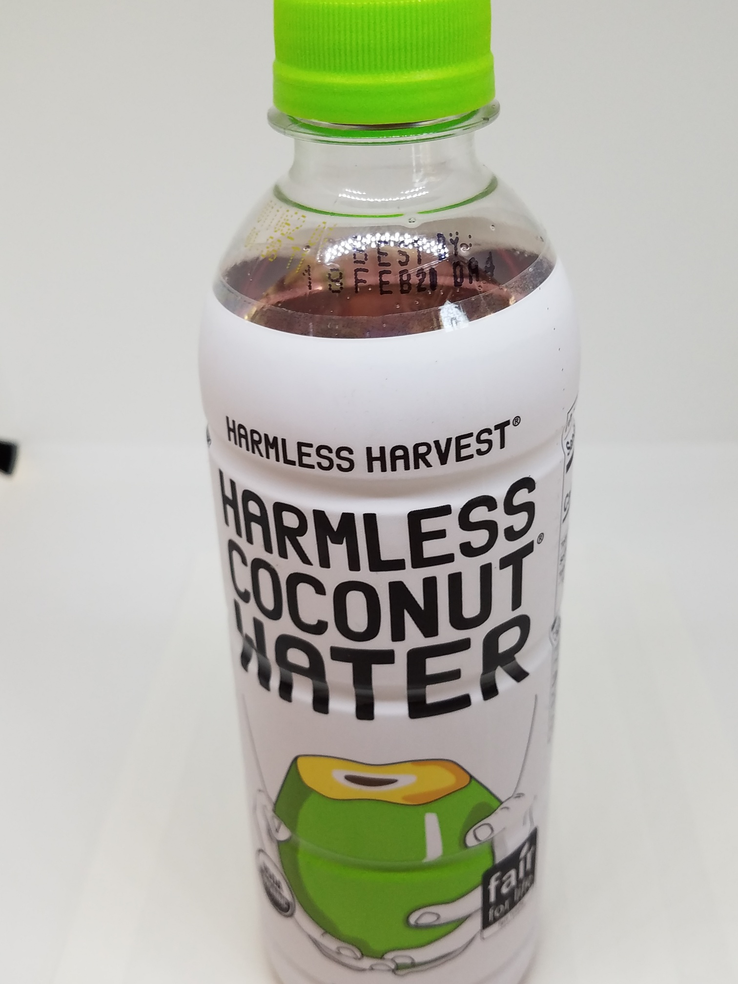 Order Harmless raw coconut water 14 fl oz food online from Bellissimo Venice store, Venice on bringmethat.com