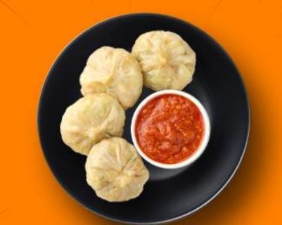 Order Veg Steamed Momo food online from Mad Over Curry store, Youngstown on bringmethat.com