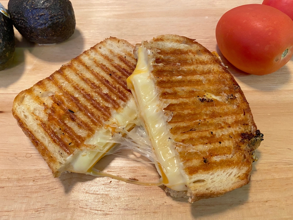 Order Four Cheese Panini food online from Deli-icious store, San Diego on bringmethat.com