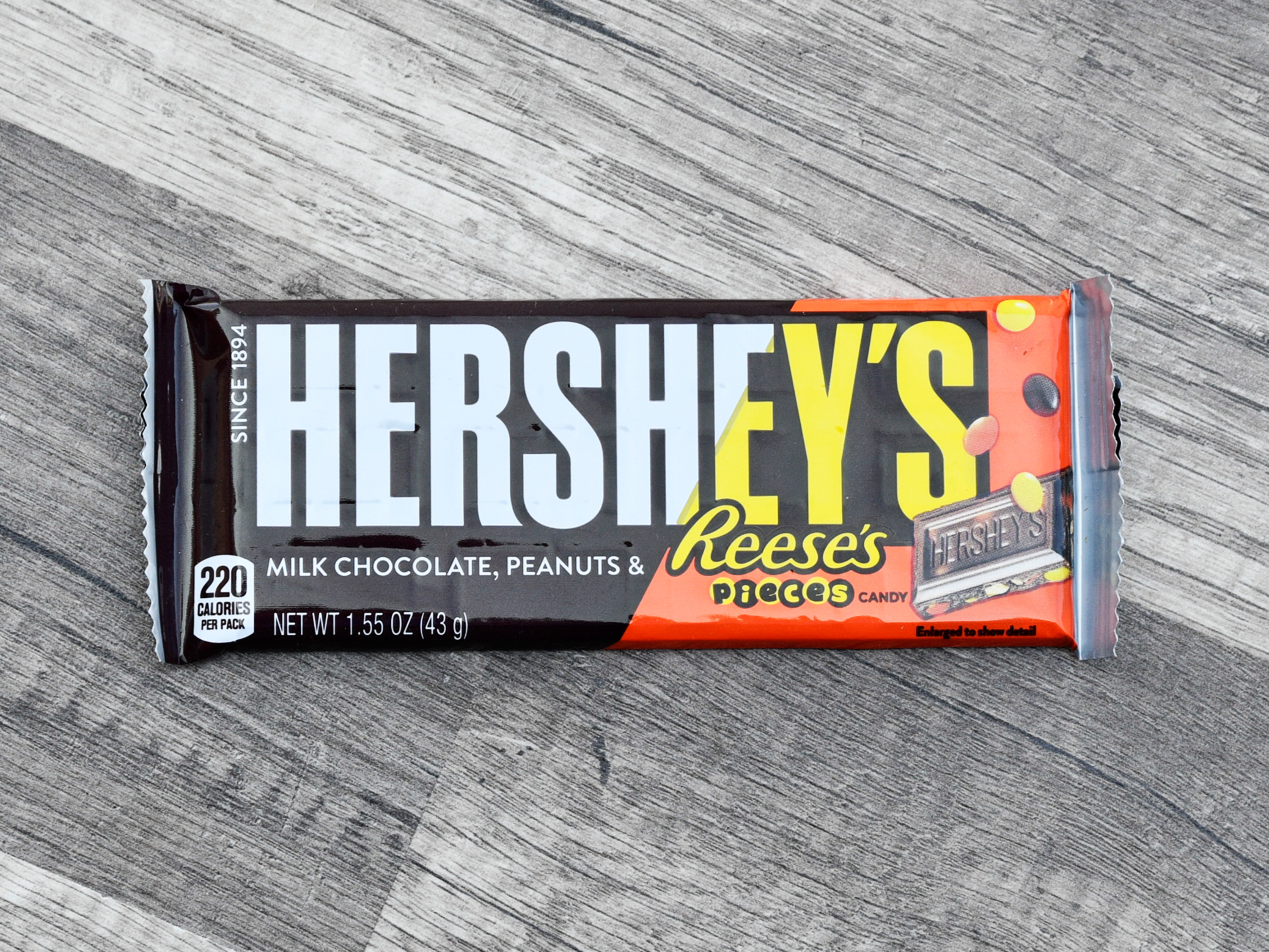 Order 1.45 oz. Hershey's Milk Chocolate with Reese's Pieces food online from Iris Shop store, Los Angeles on bringmethat.com