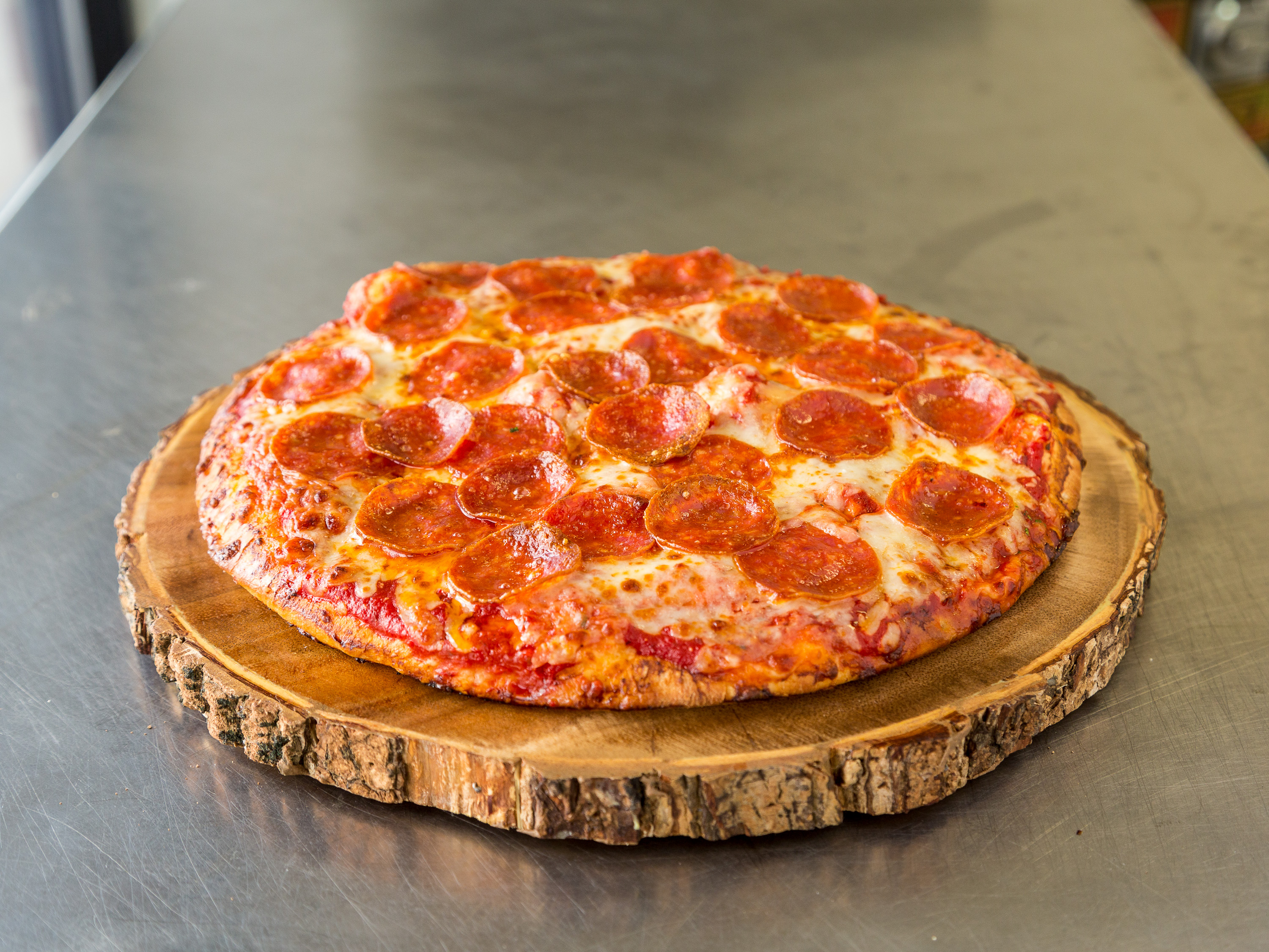 Order Loaded 3X Pepperoni Pizza food online from Revolution Pizza store, Willowick on bringmethat.com