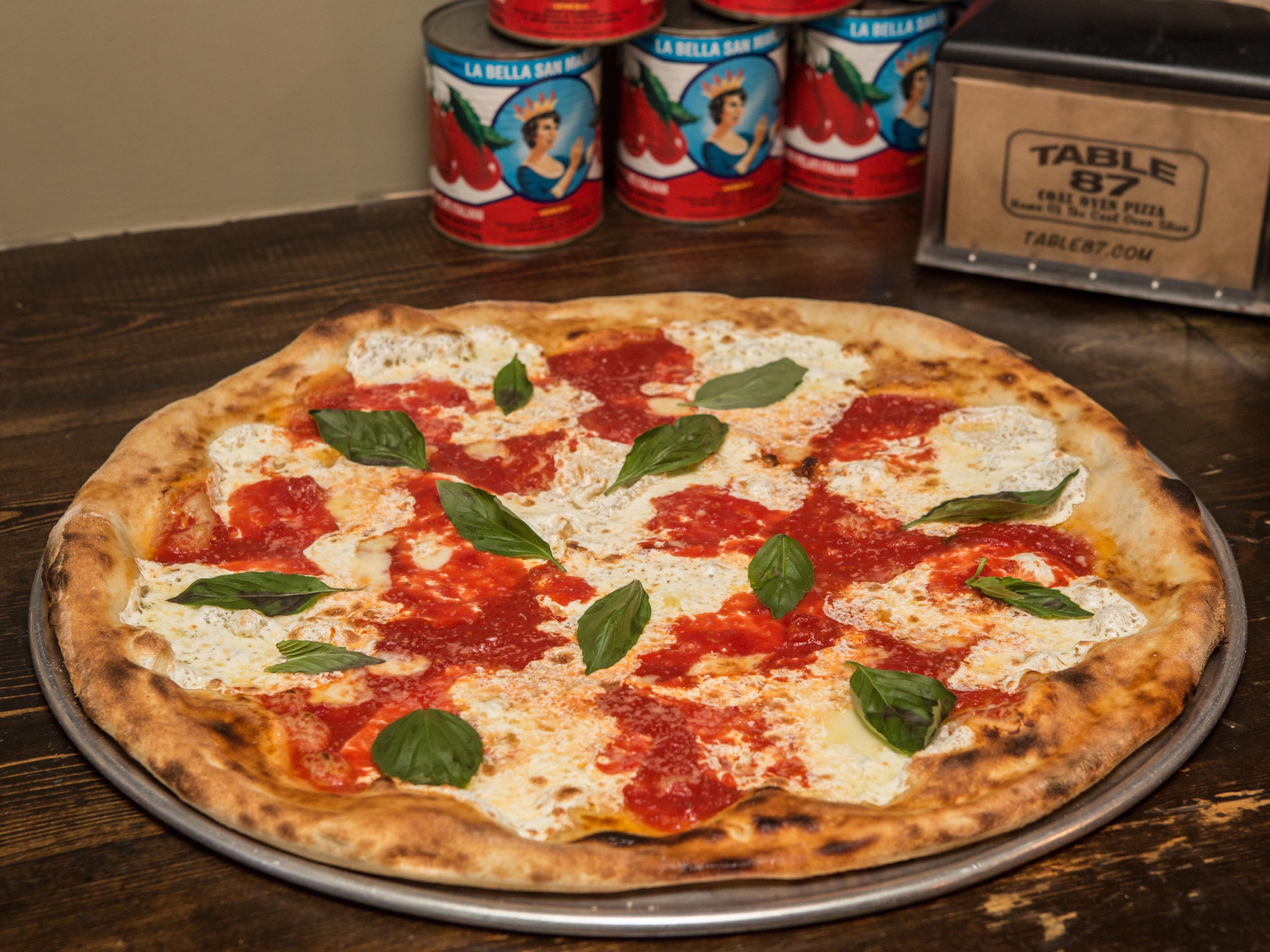 Order 12" Margherita Pizza food online from Table 87 coal oven pizza * by the slice * store, Brooklyn on bringmethat.com