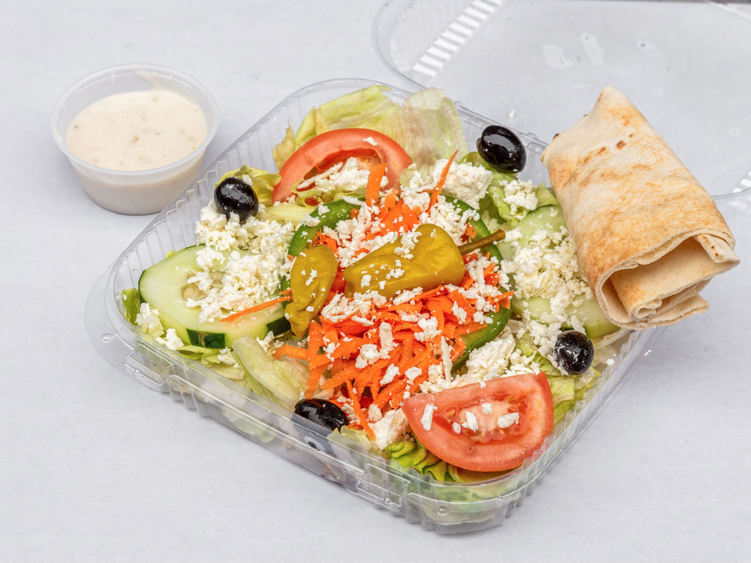 Order Greek Salad food online from Arboretum Pizza Grill store, Roslindale on bringmethat.com