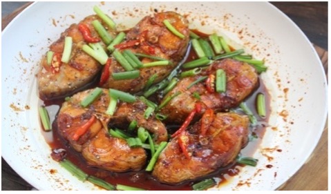 Order 73. Caramel Fish food online from Saigon Noodles & Grill store, Arlington on bringmethat.com