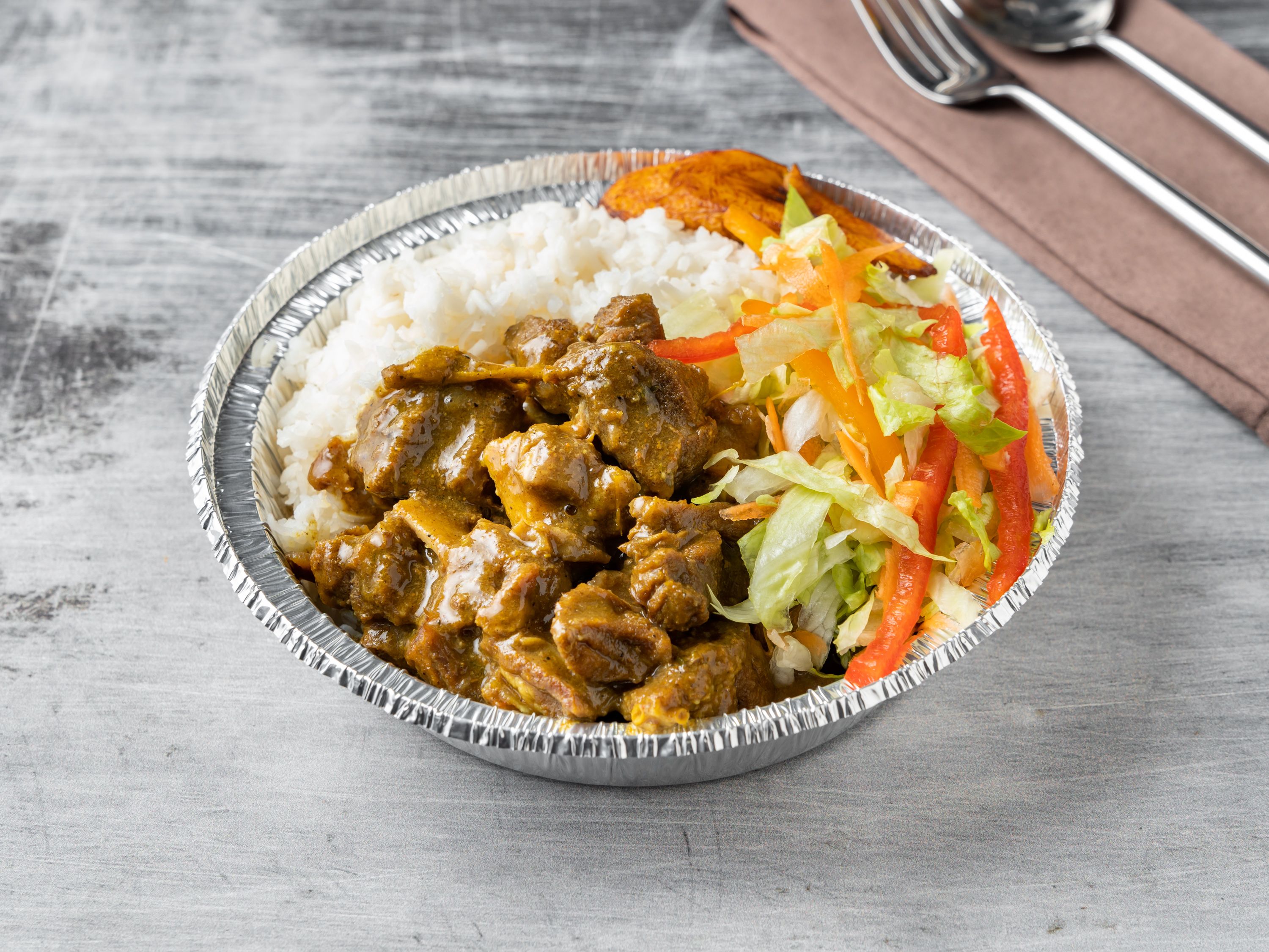 Order Curried Goat food online from JD's Yard Style Restaurant store, Jamaica on bringmethat.com