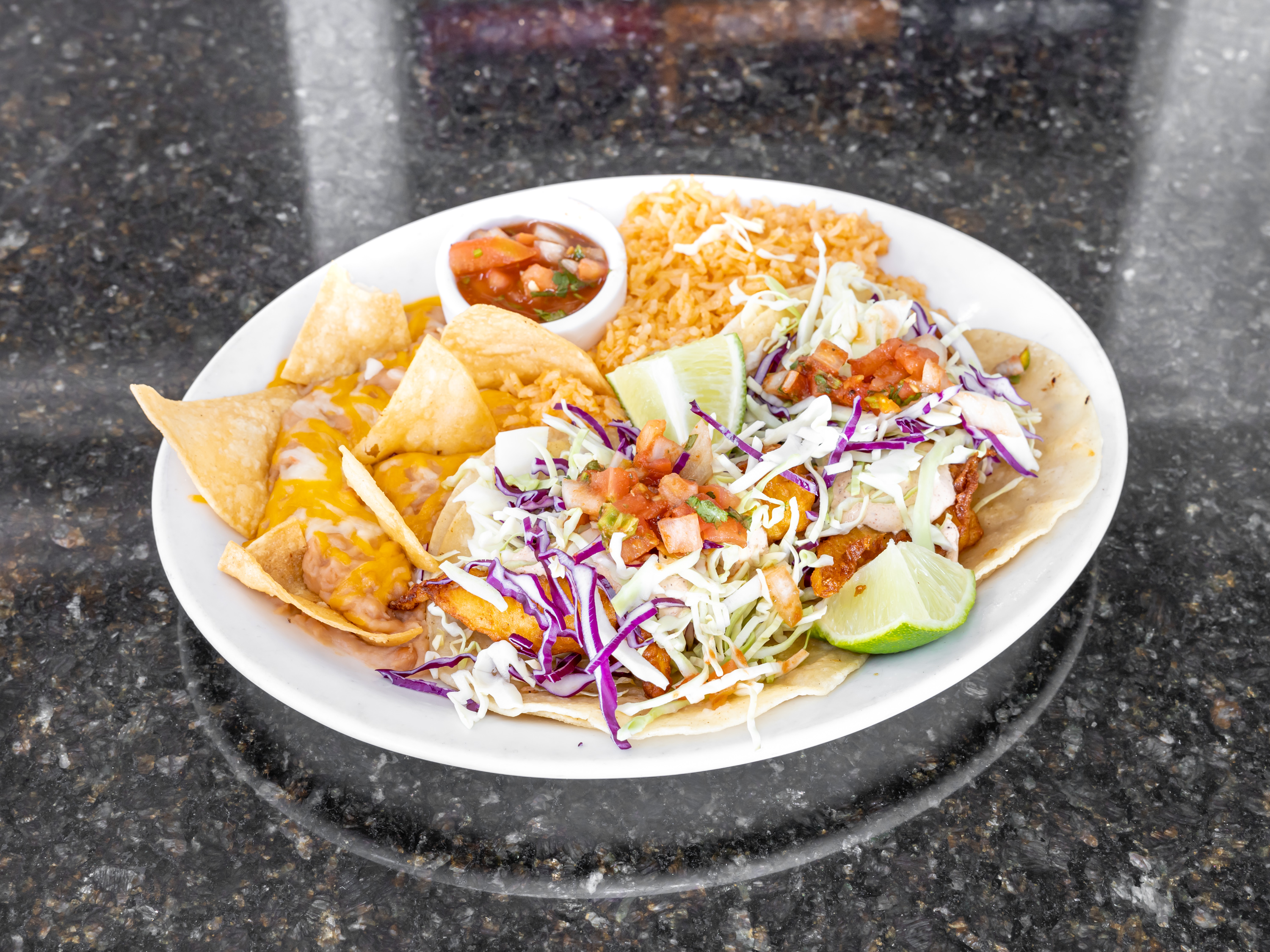 Order 2 Piece Fish Tacos Plate food online from Uncle Pete Cafe store, Westminster on bringmethat.com
