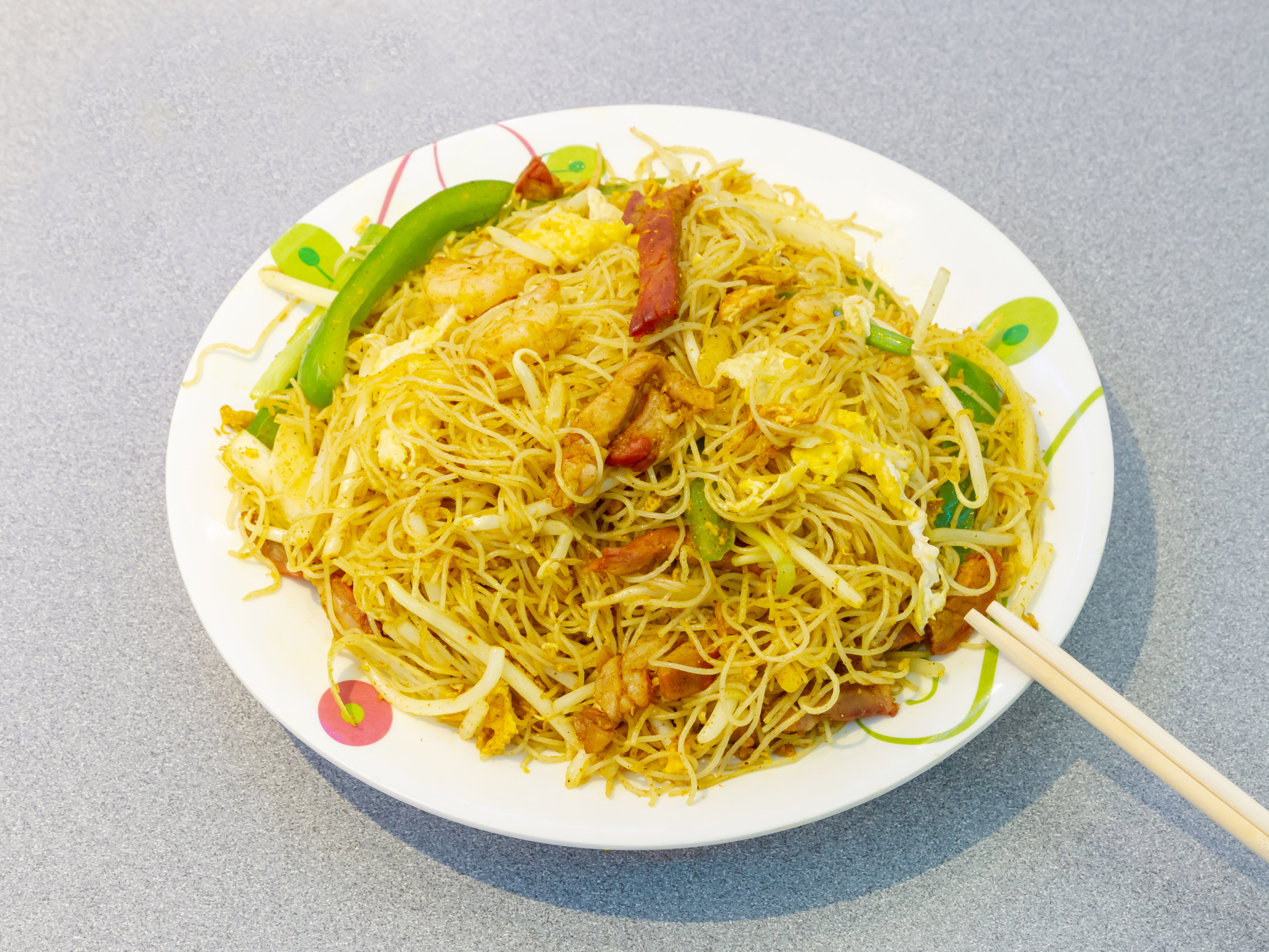 Order Singapore rice Noodle food online from Wong's Of Boston store, Boston on bringmethat.com