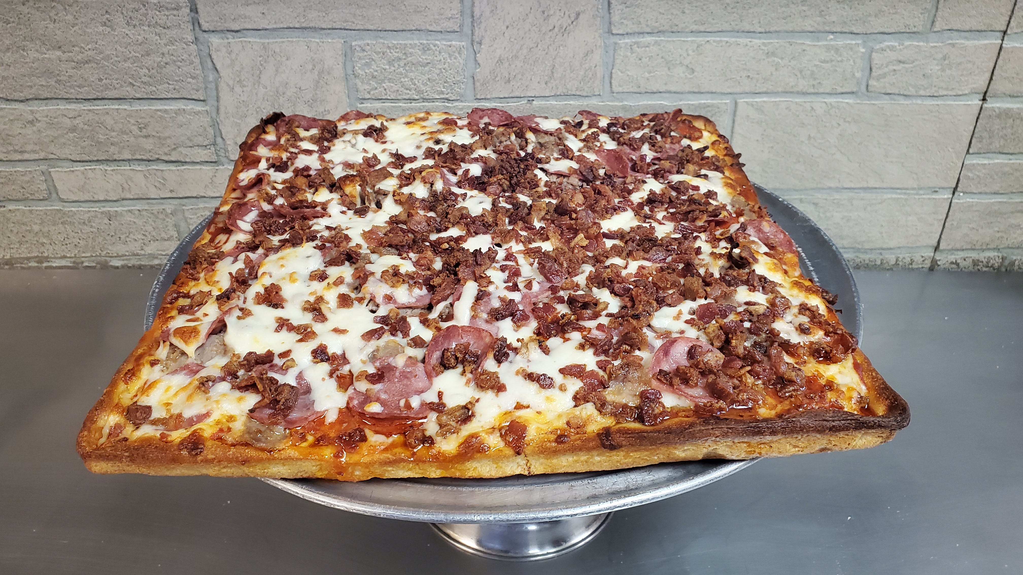 Order Meat Lovers Sicilian Thick Pizza - 16''x16'' food online from Taste of Italy Pizza and Pasta store, Goodyear on bringmethat.com
