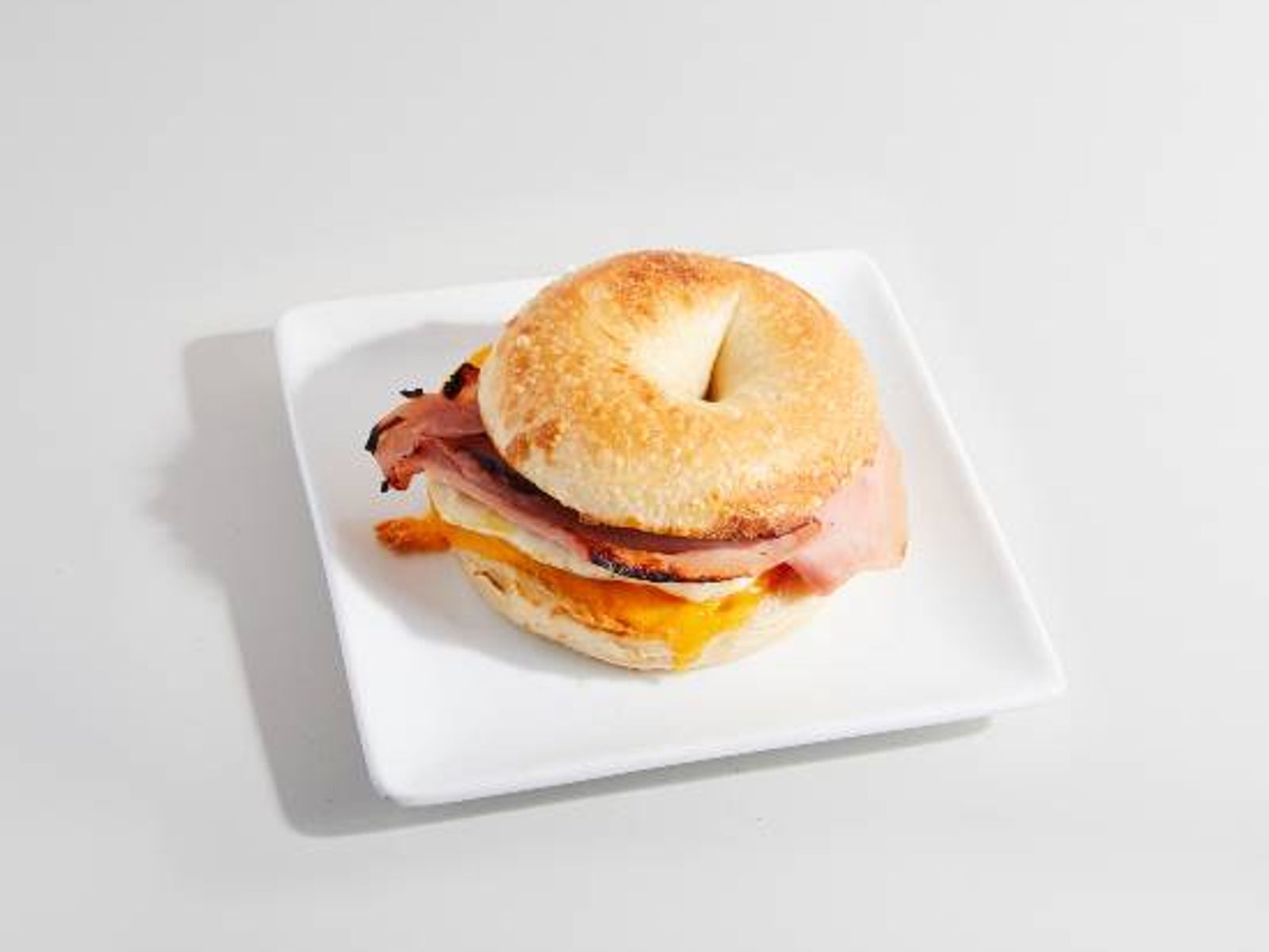 Order Egg, Cheese, & Ham Bagel food online from Sweetwaters Coffee & Tea store, Shelby Charter Township on bringmethat.com