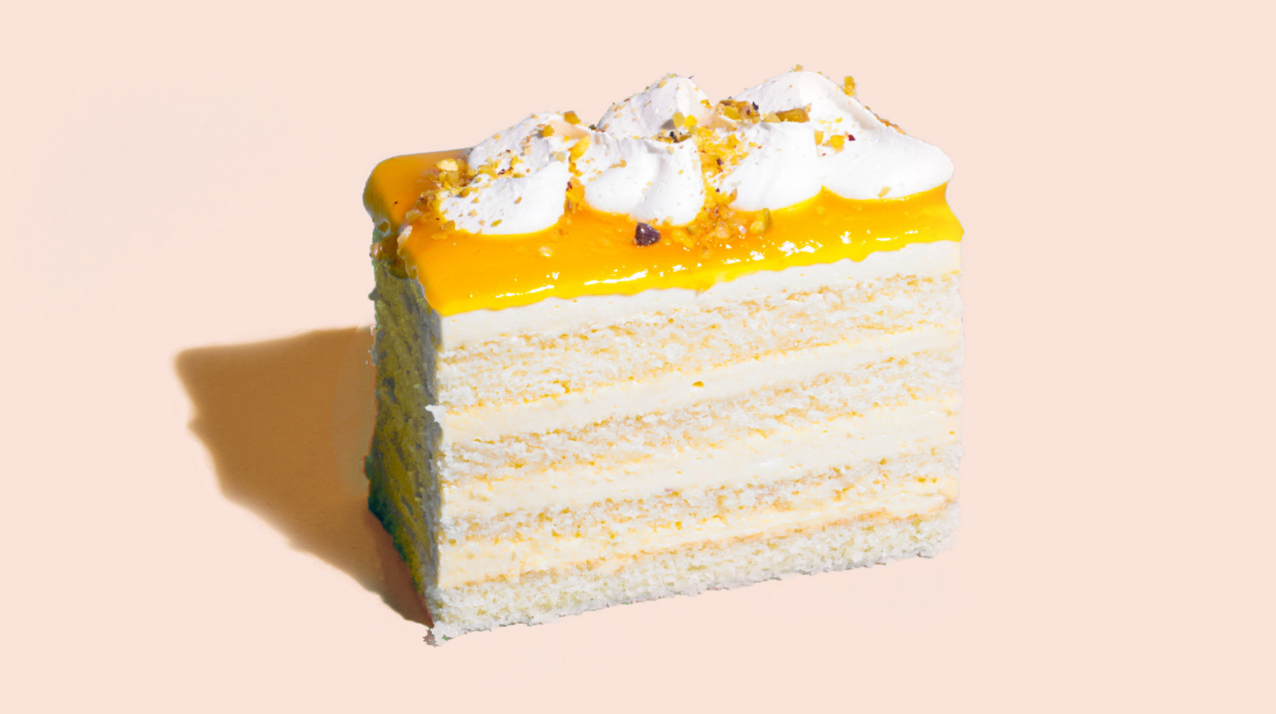 Order Mango Cream Cake food online from Oasis Cafe store, Flushing on bringmethat.com