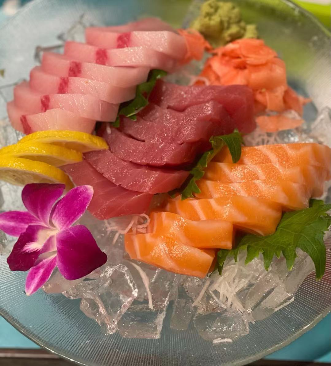 Order Tuna, Yellowtail and Salmon Sashimi Dinner food online from Chikurin Sushi store, Brooklyn on bringmethat.com