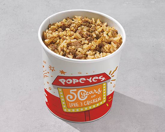 Order Cajun Rice Lrg food online from Popeyes Chicken & Biscuits store, Rehoboth Beach on bringmethat.com
