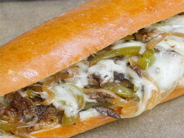Order Chicken Cheese Steak Sub food online from Tharsy Grill store, Baltimore on bringmethat.com