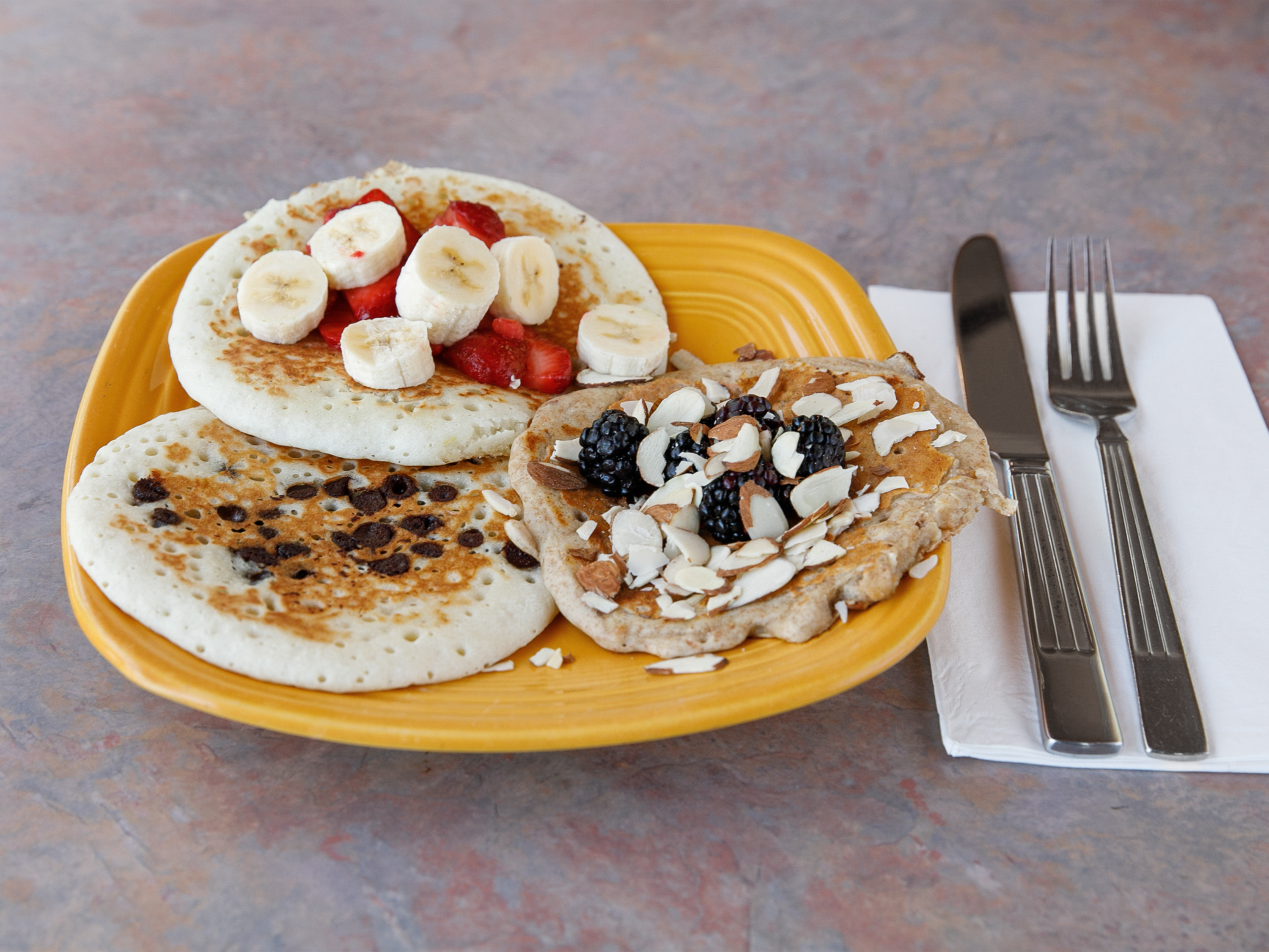 Order Pancake Sampler food online from Crest Cafe store, San Diego on bringmethat.com