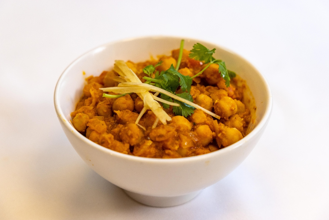 Order Chana Masala food online from Spice symphony store, New York on bringmethat.com