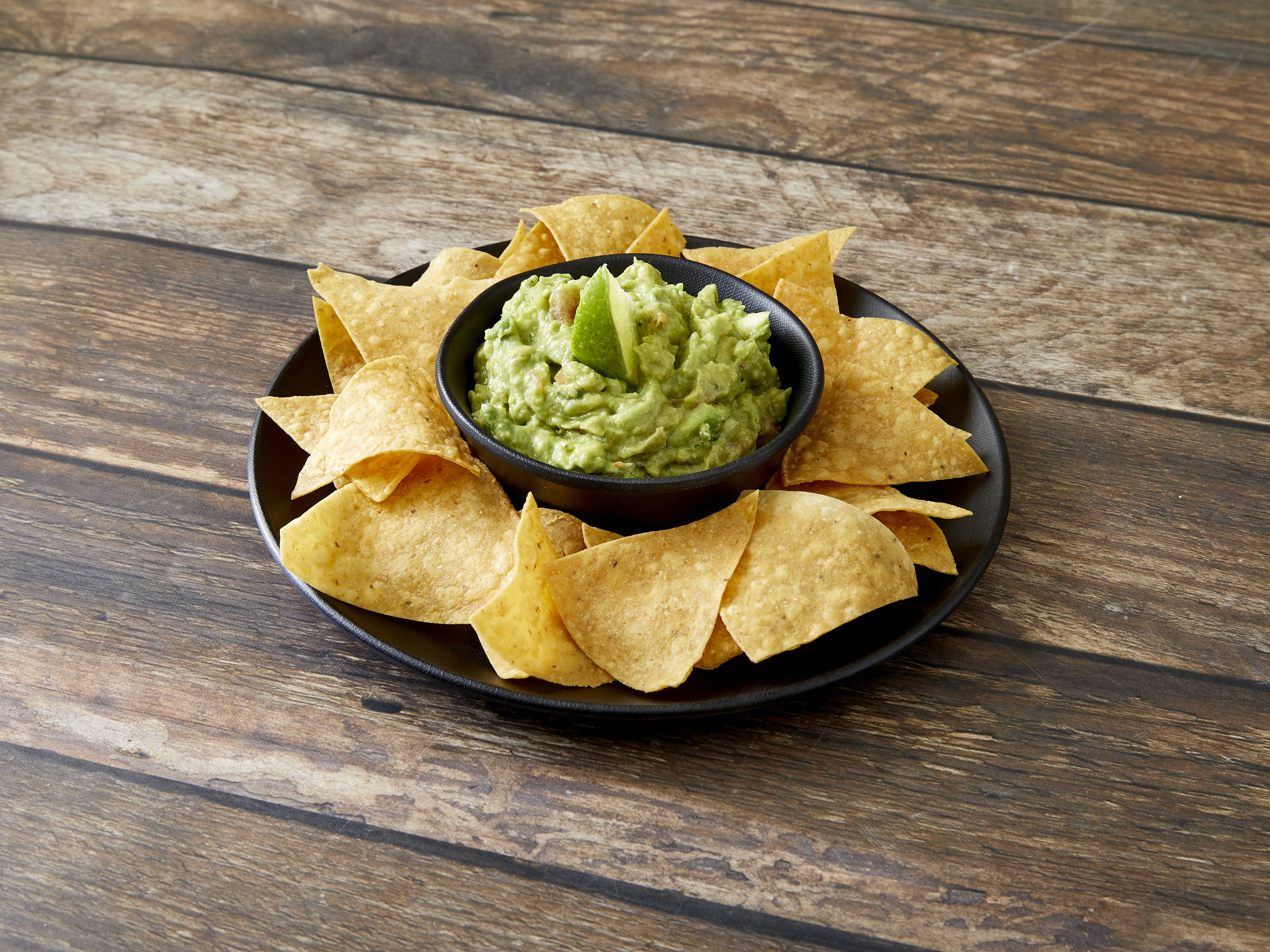 Order Guacamole and Chips food online from 4 Hermanos Too store, Chicago on bringmethat.com