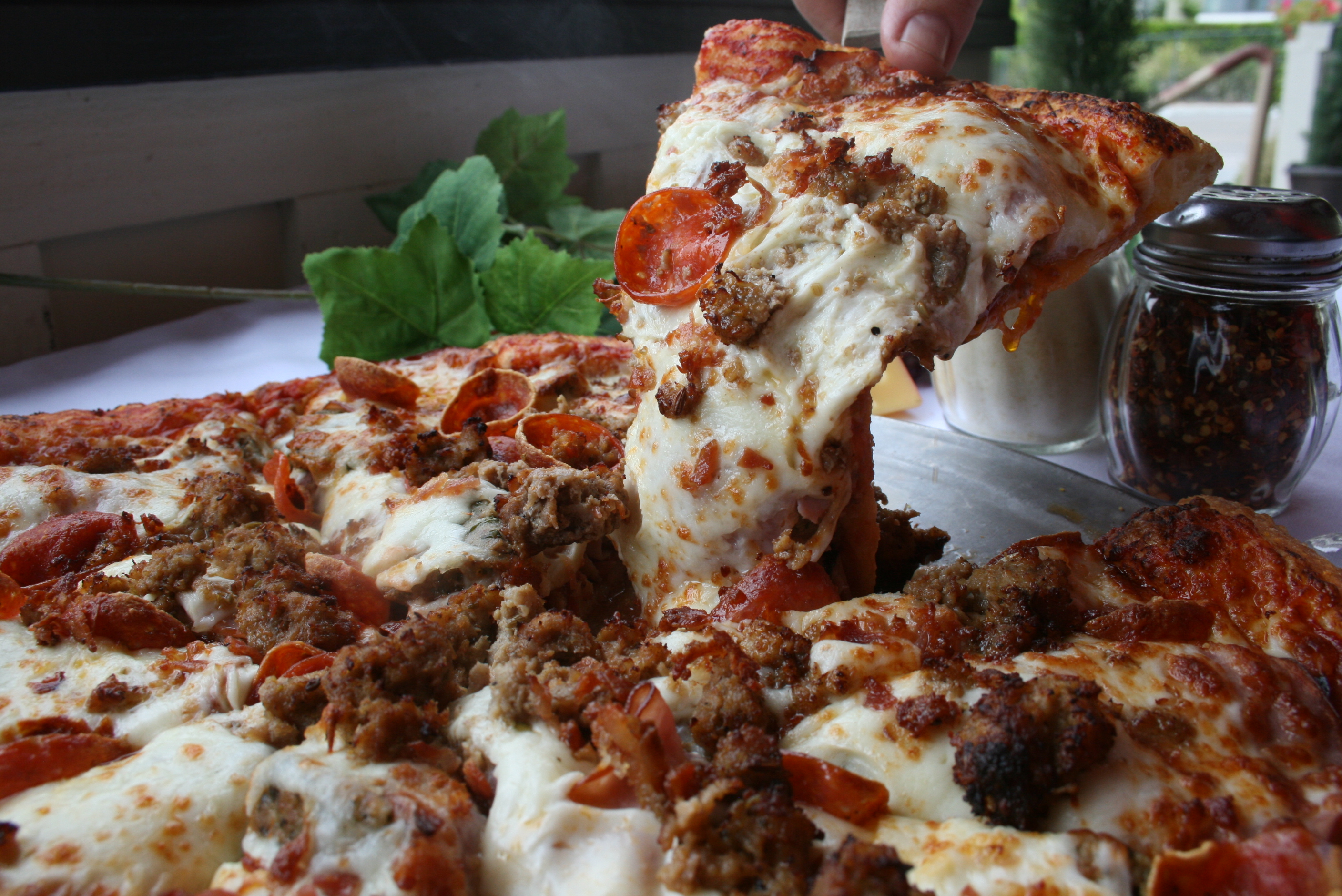 Order Meat Lovers Pizza food online from Nicolosi's Italian Restaurant store, San Diego on bringmethat.com