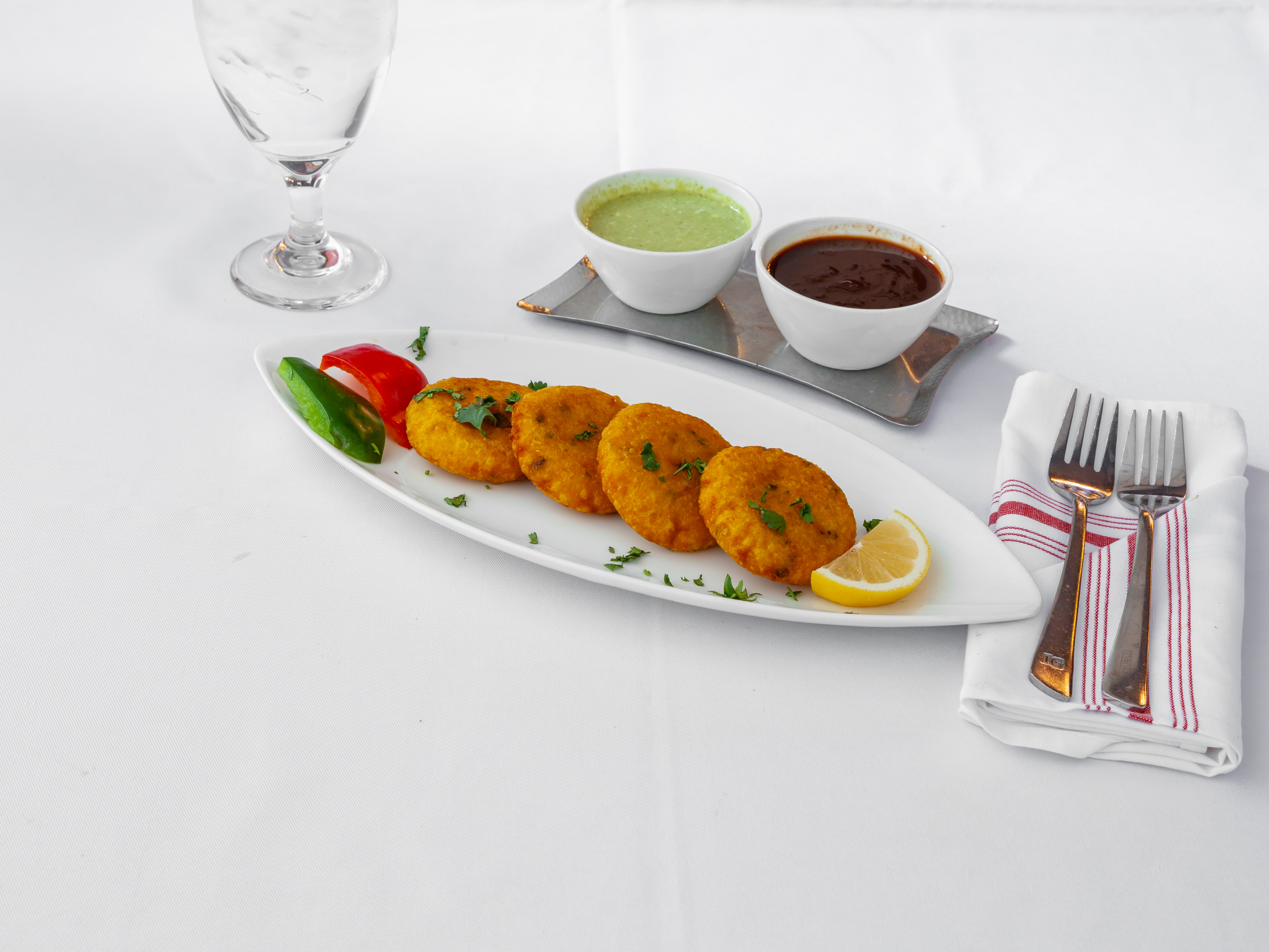 Order Aloo Tikka-4 Pcs food online from Indian Garden store, Chicago on bringmethat.com