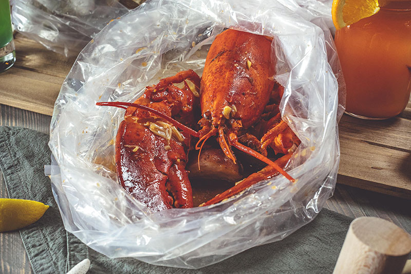 Order Lobster Boil(1 1/4 lb) food online from Holy Crab Cajun Seafood store, White Plains on bringmethat.com