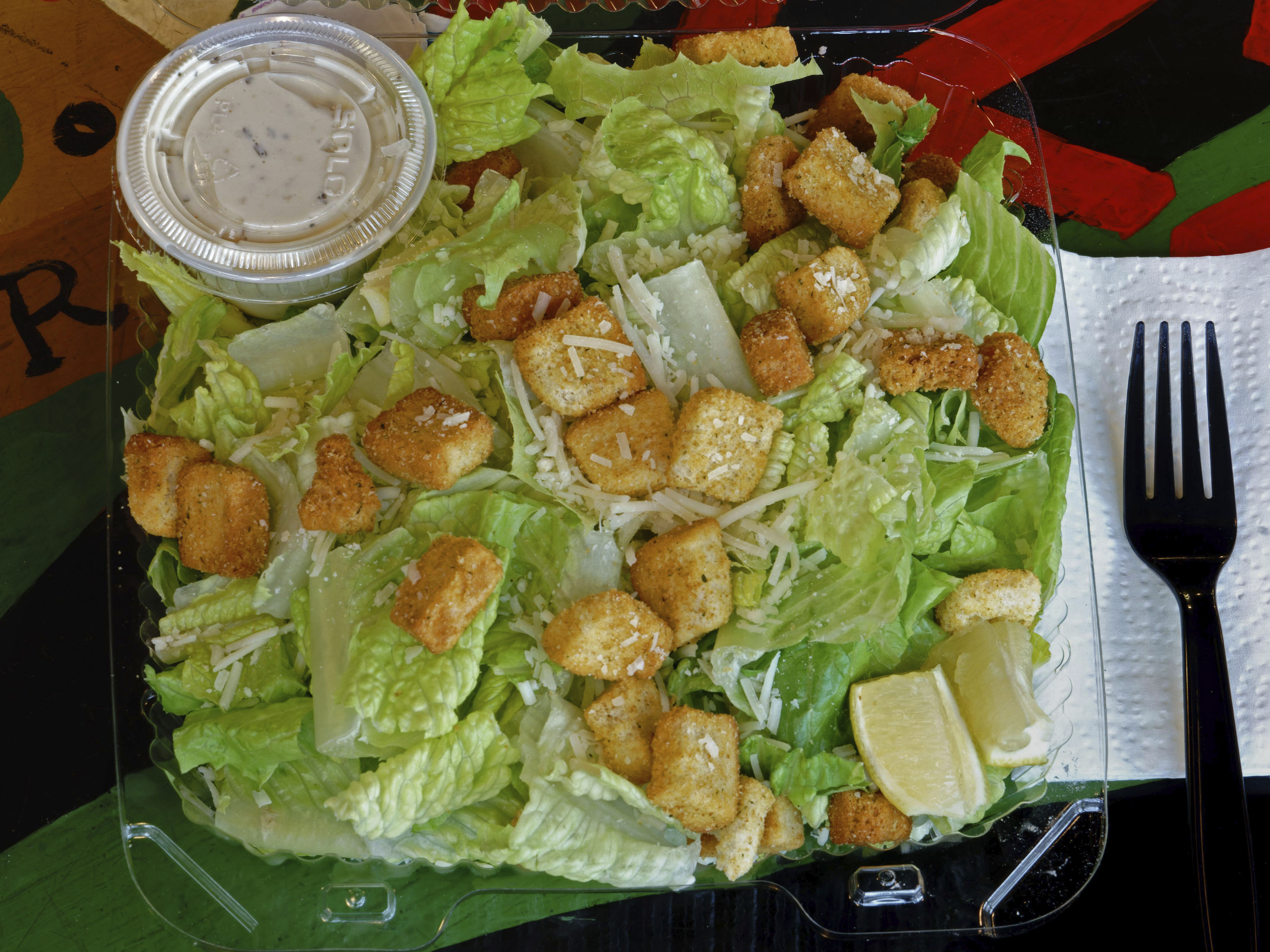 Order Caesar Salad food online from Pudge Bros. Pizza store, Seattle on bringmethat.com