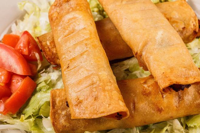Order 38. Flautas (4 pcs) food online from Los Tres Amigos Mexican Restaurant store, Slidell on bringmethat.com