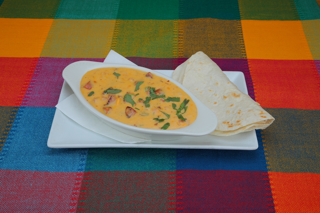 Order Choriqueso food online from Refried Beans store, New York on bringmethat.com