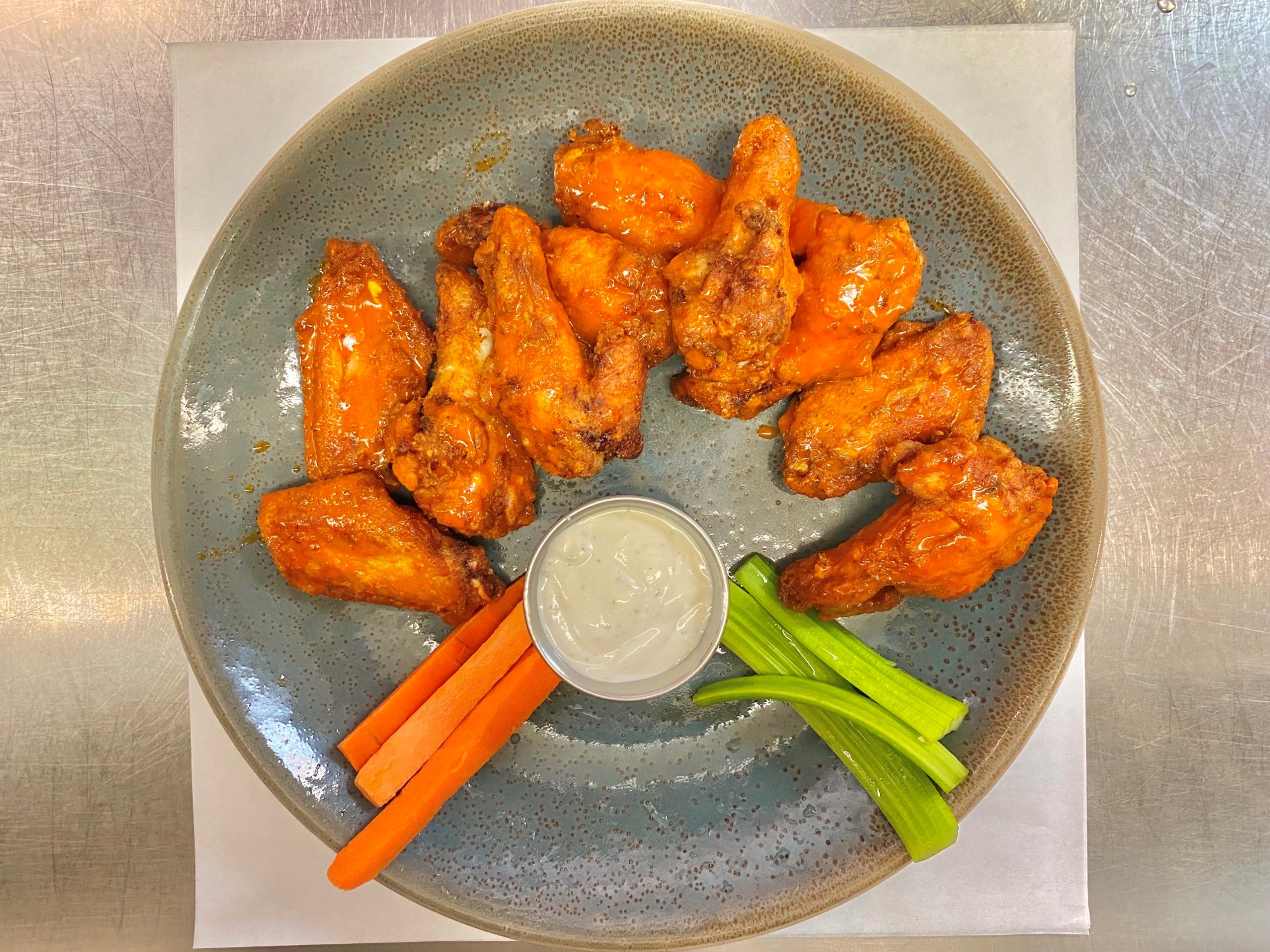 Order Buffalo Chicken Wings food online from Tony Roma's store, Anaheim on bringmethat.com