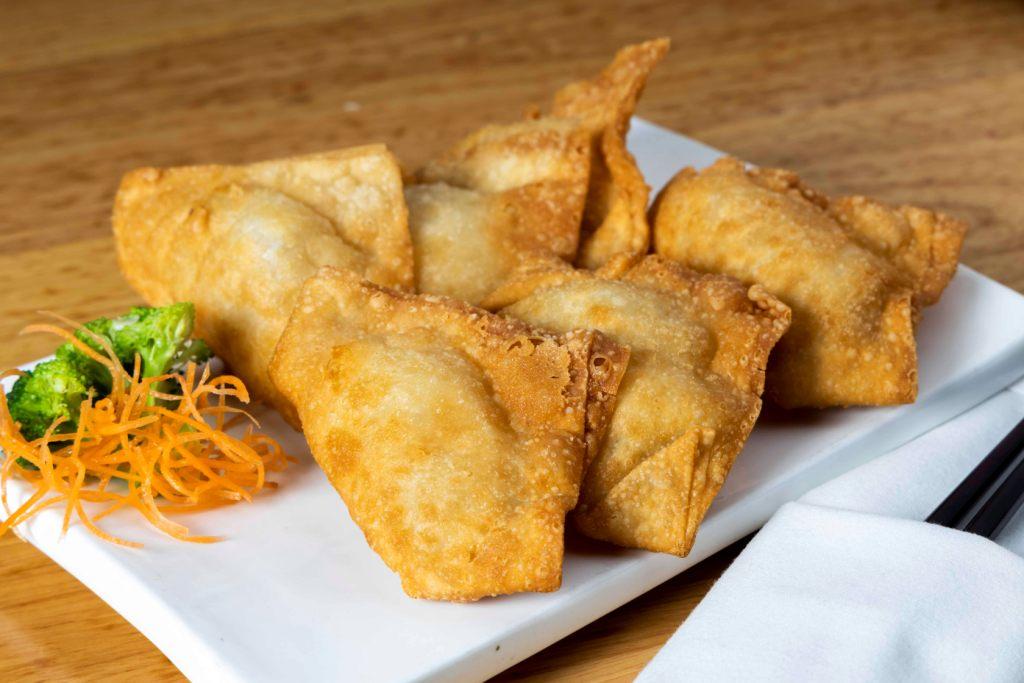 Order 030. 6 Piece Crab Rangoon food online from Chi Tung Chinese & Thai Restaurant store, Evergreen Park on bringmethat.com